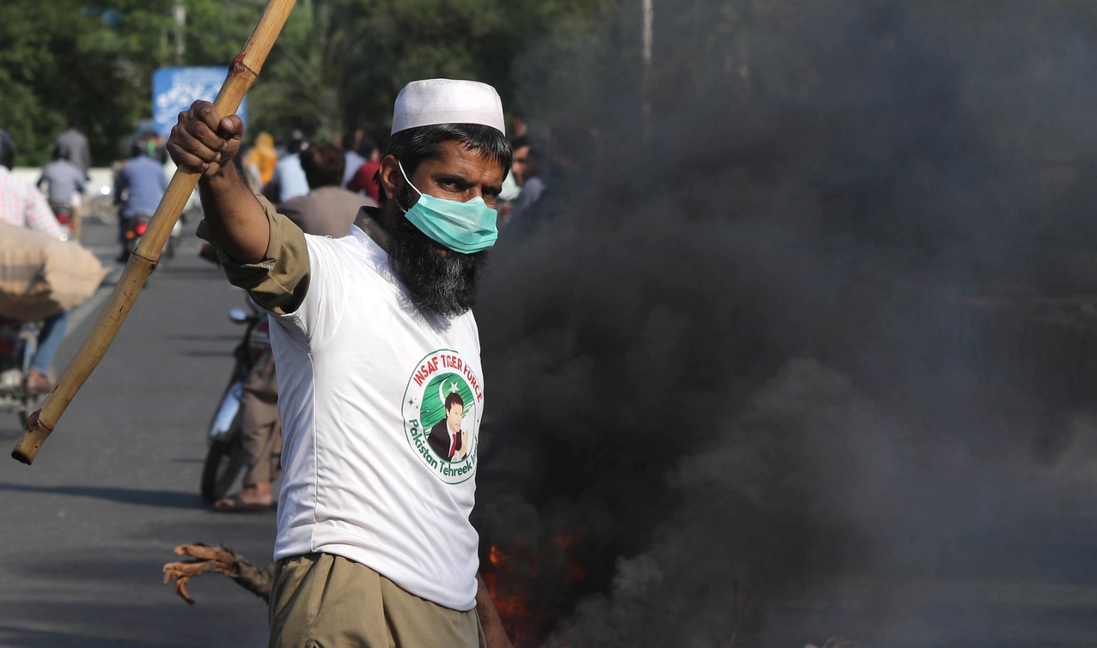 Thousands of PTI supporters stormed the streets on May 9 last year to protest their leader Imran Khan's detention. [Rahat Dar/EPA]