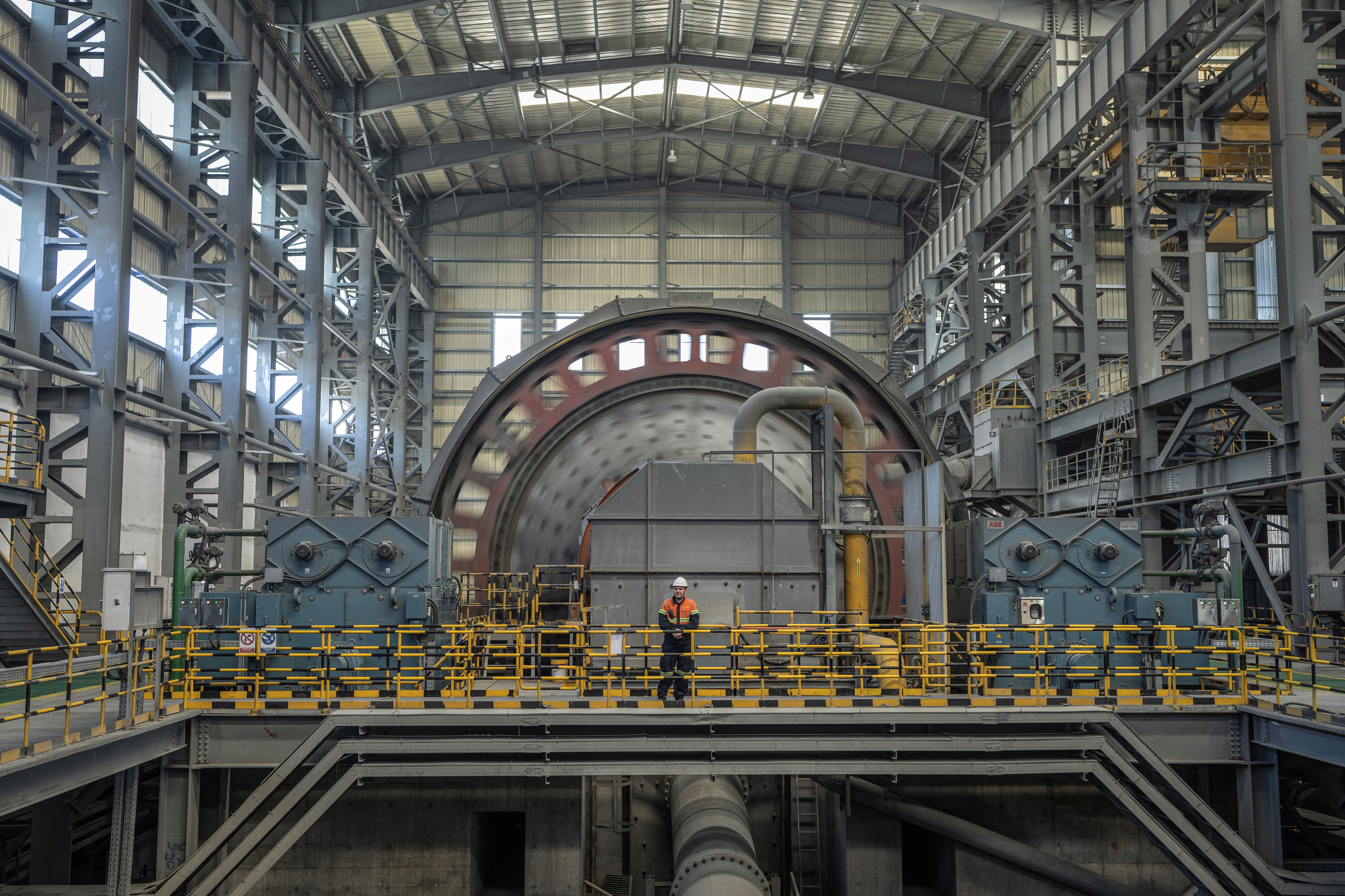 A worker stands in a mill, which is part of a copper mine, run by a subsidiary of China's Zijin Mining, near the village of Krivelj, Serbia, April 5