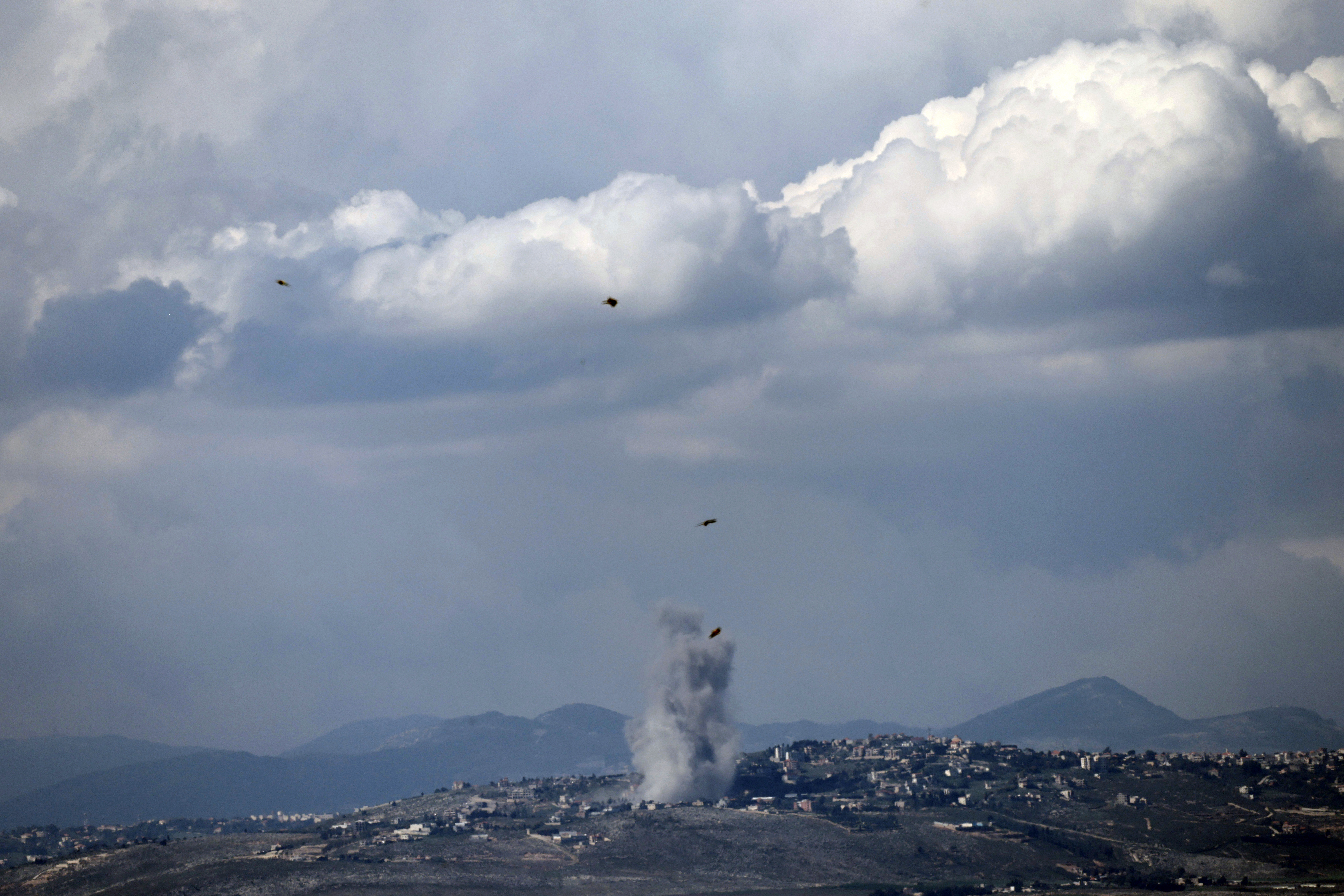 A picture taken from Israel along the border with southern Lebanon shows smoke billowing during Israeli bombardment in the Lebanese village of Khiam on April 8