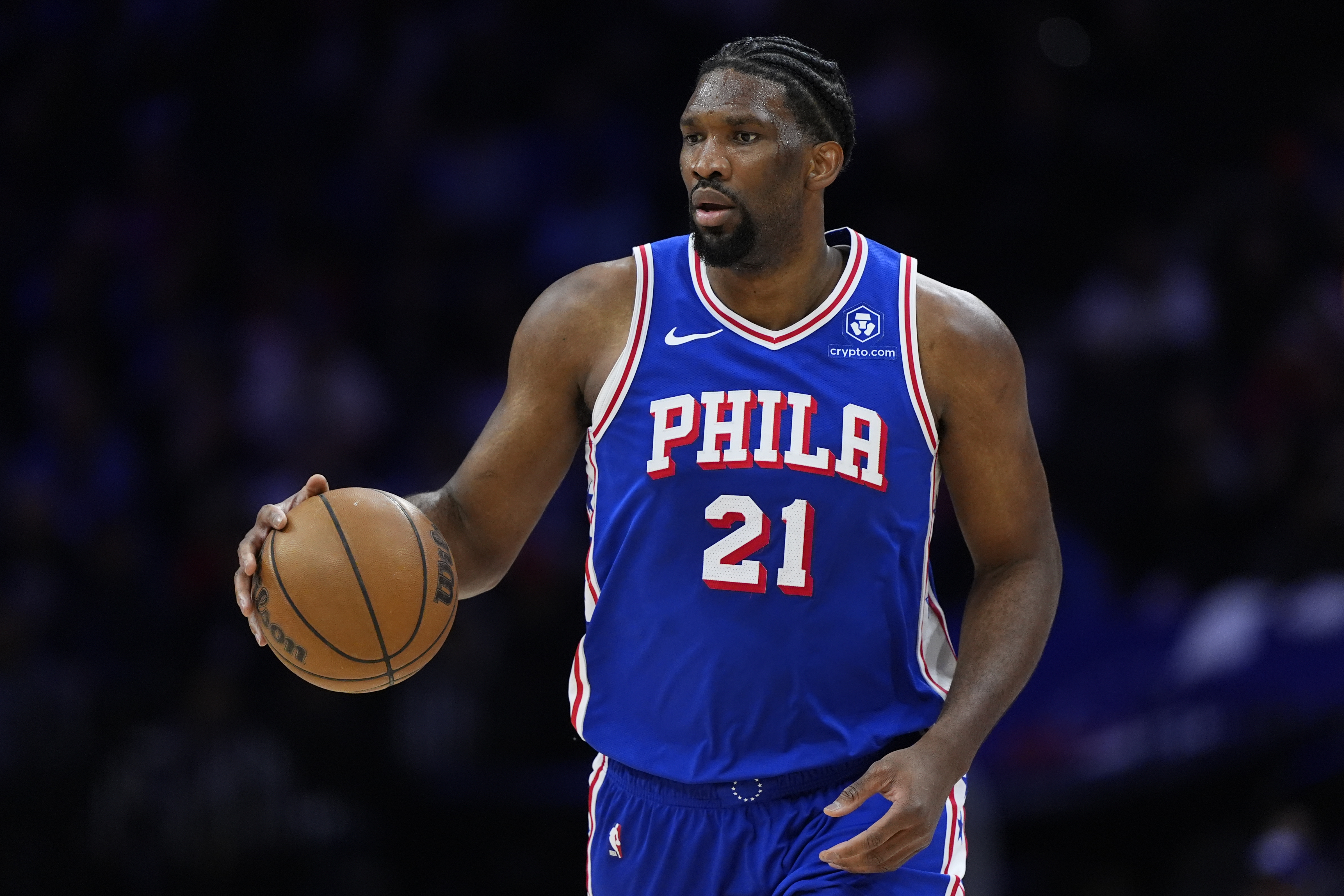 Joel Embiid on basketball court.