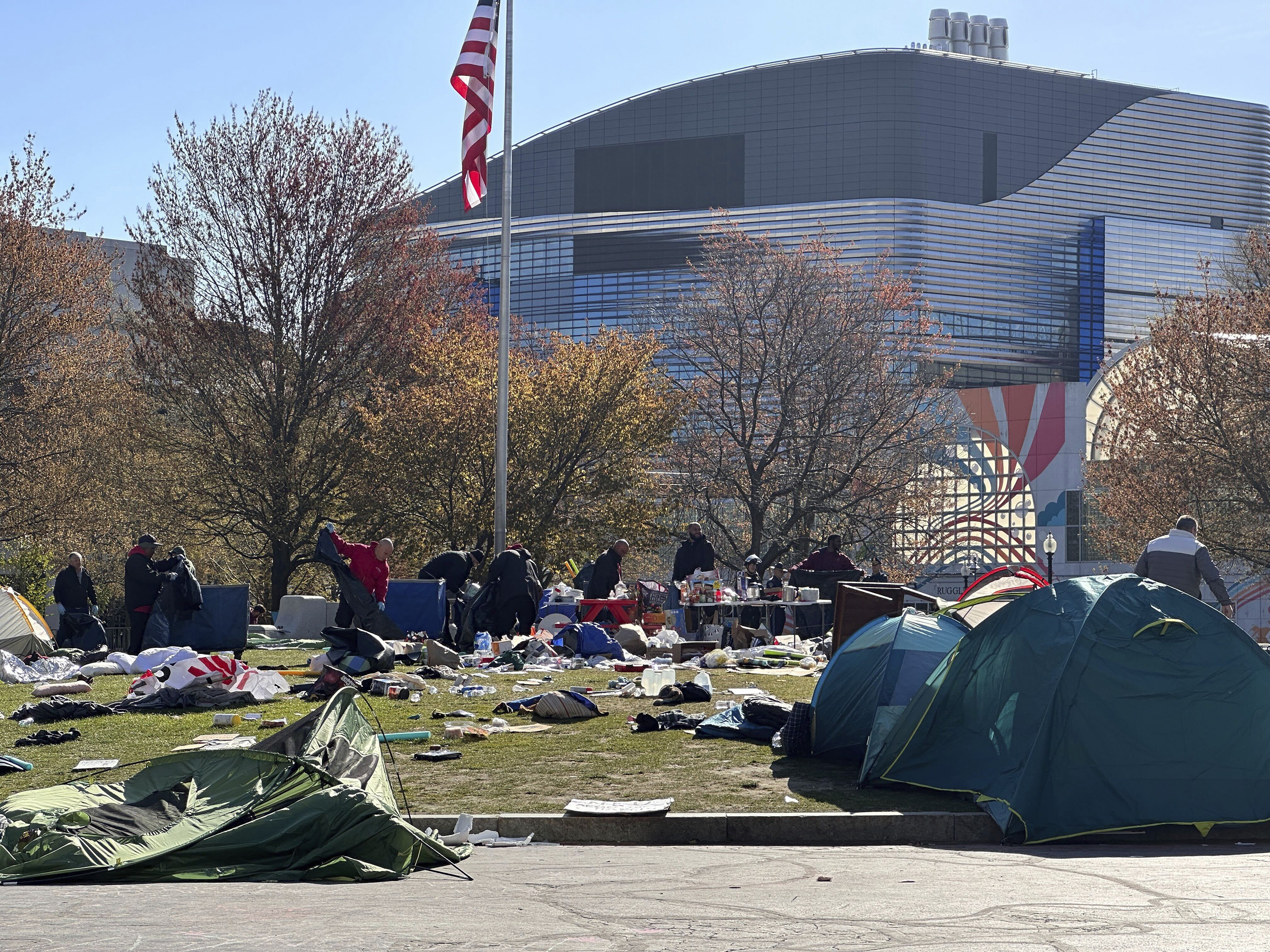 Police clear an encampment on the Northeastern University campus in Boston, early Saturday, April 27, 2024.