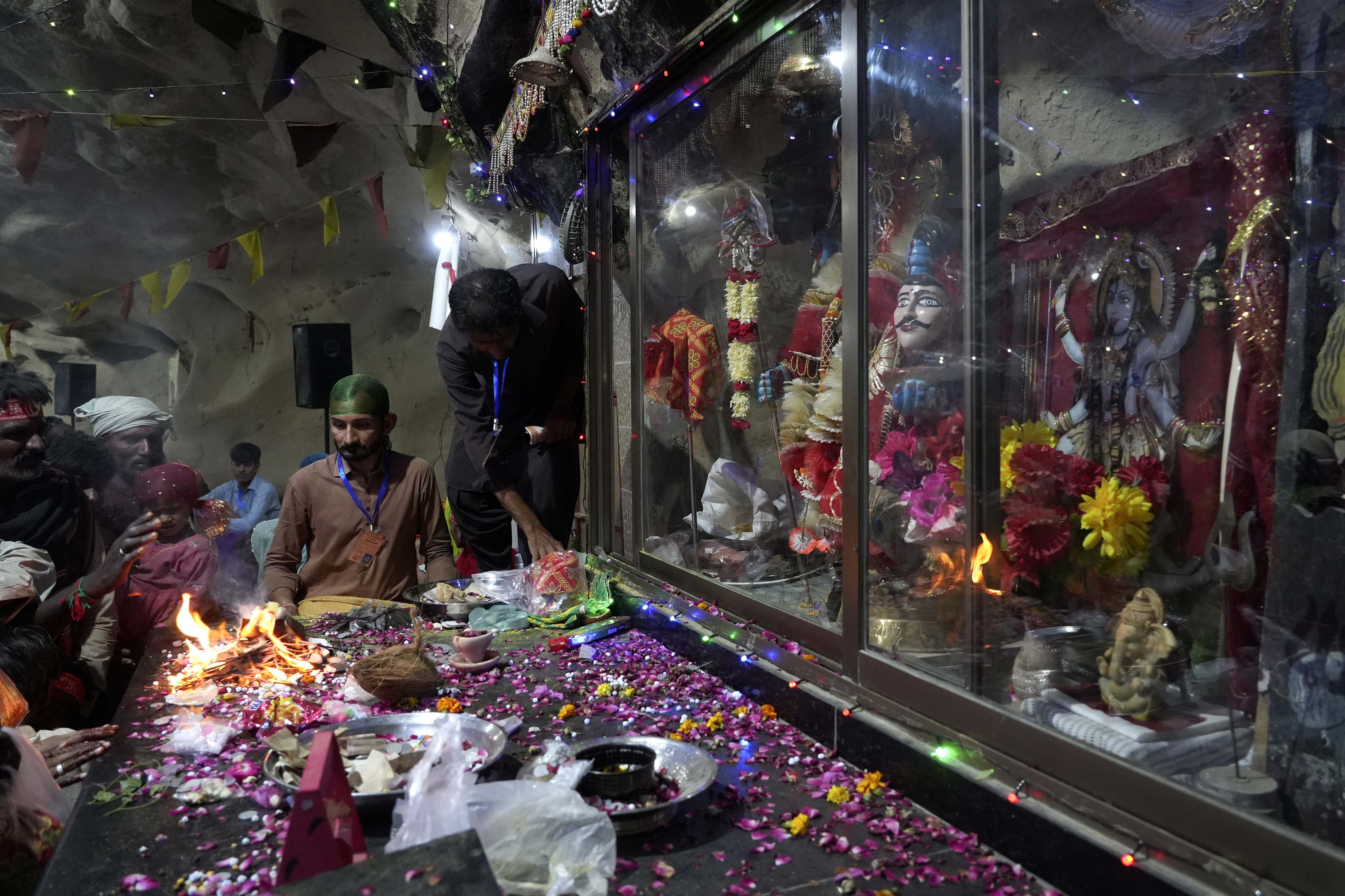 Hindu devotees perform their rituals during an annual festival in an ancient cave temple of Hinglaj Mata in Hinglaj in Lasbela district in Pakistan's southwestern Baluchistan province, Friday, April 26