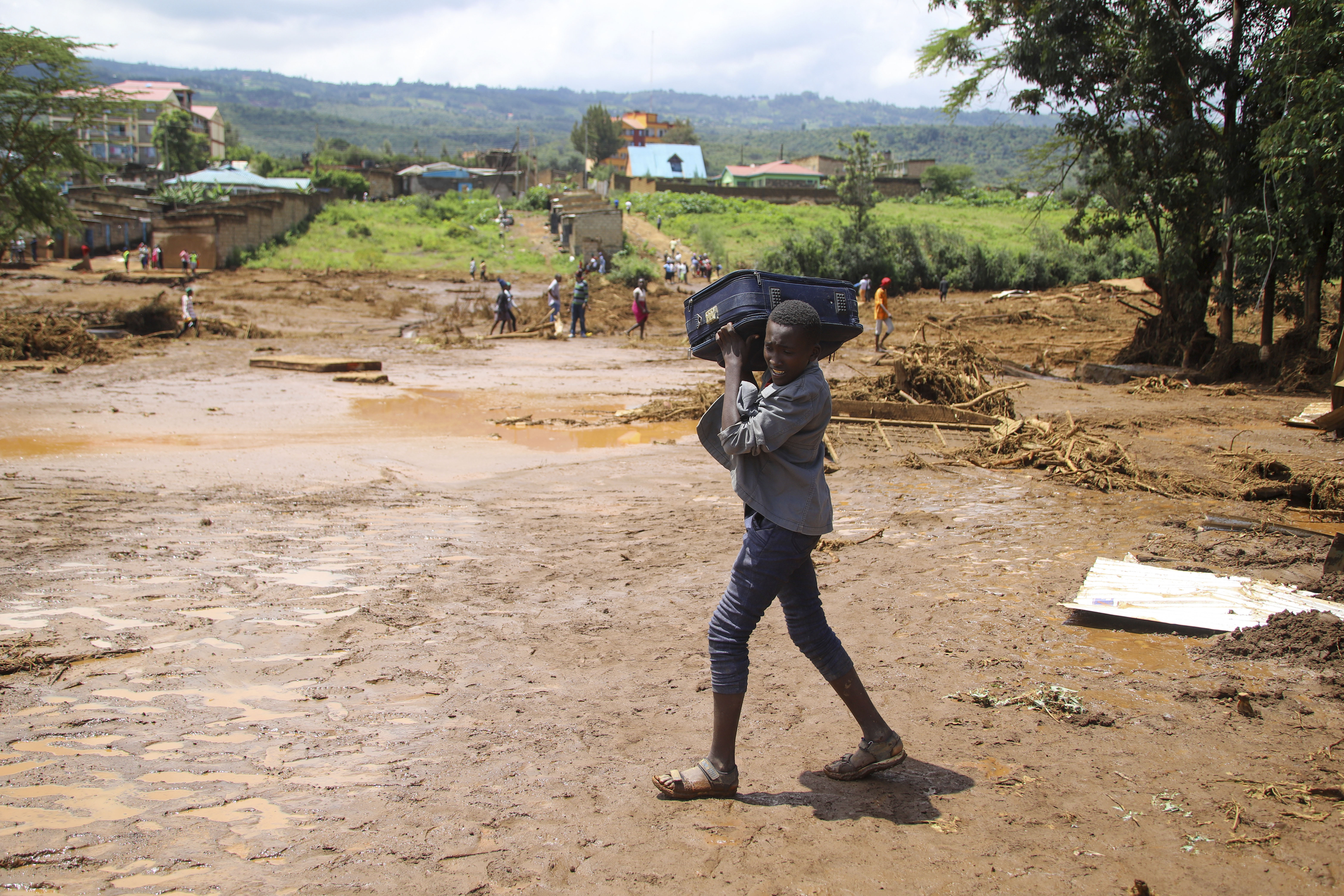 At least 45 people die in western Kenya as floodwaters sweep away houses and cars