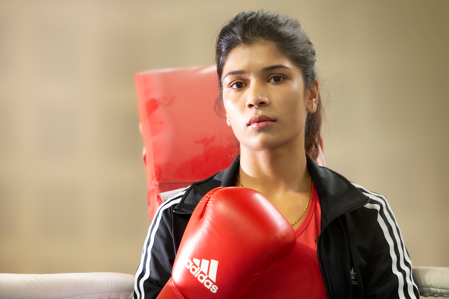 Nikhat Zareen with boxing glove.