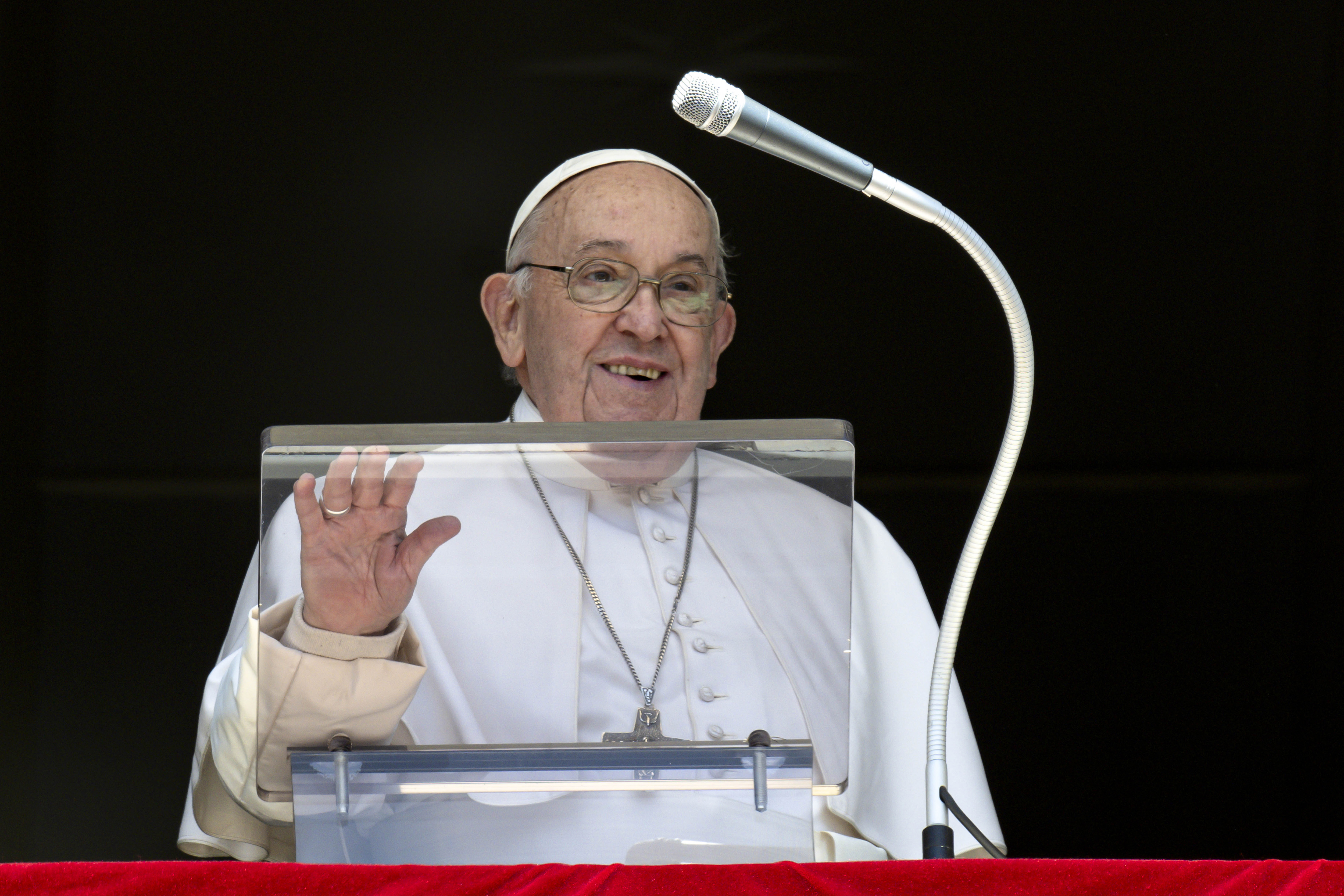 Pope Francis delivers his Angelus blessing from his studio overlooking St. Peter's Square