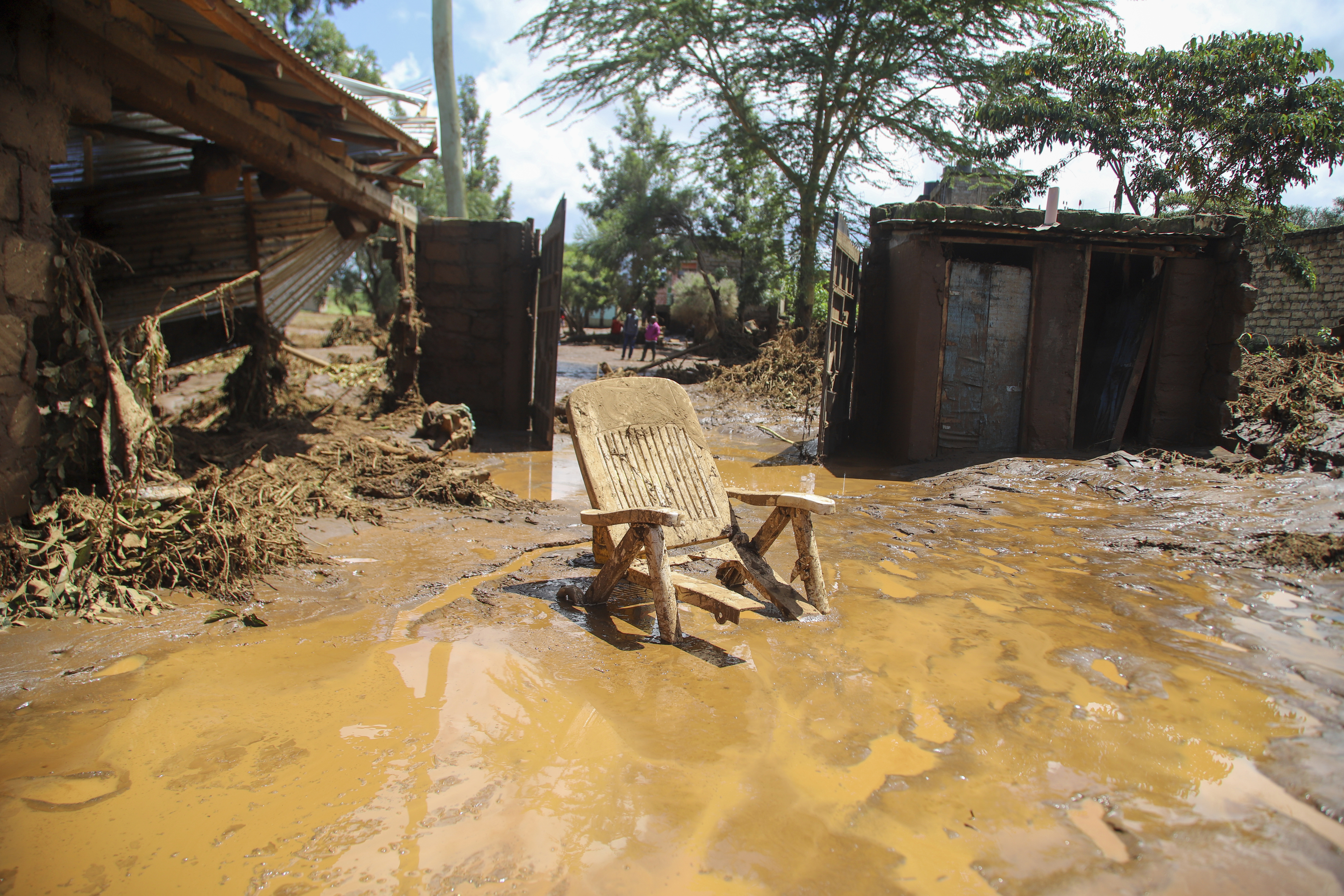 A chair stuck in the muddy water after a dam burst, in Kamuchiri Village, Mai Mahiu