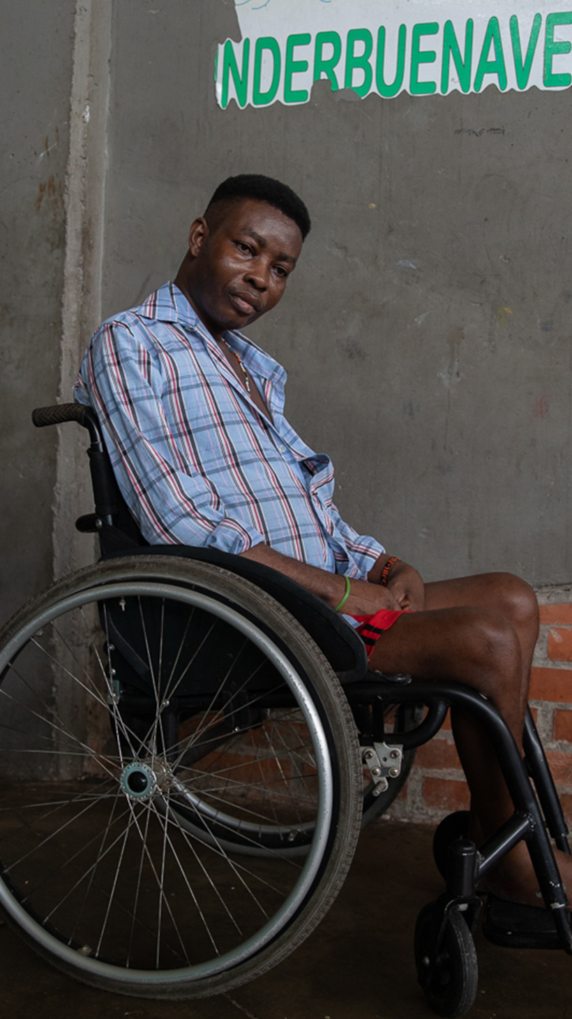 Marcial Moreno, a wheelchair user, poses for a photo in the Crystal Coliseum.