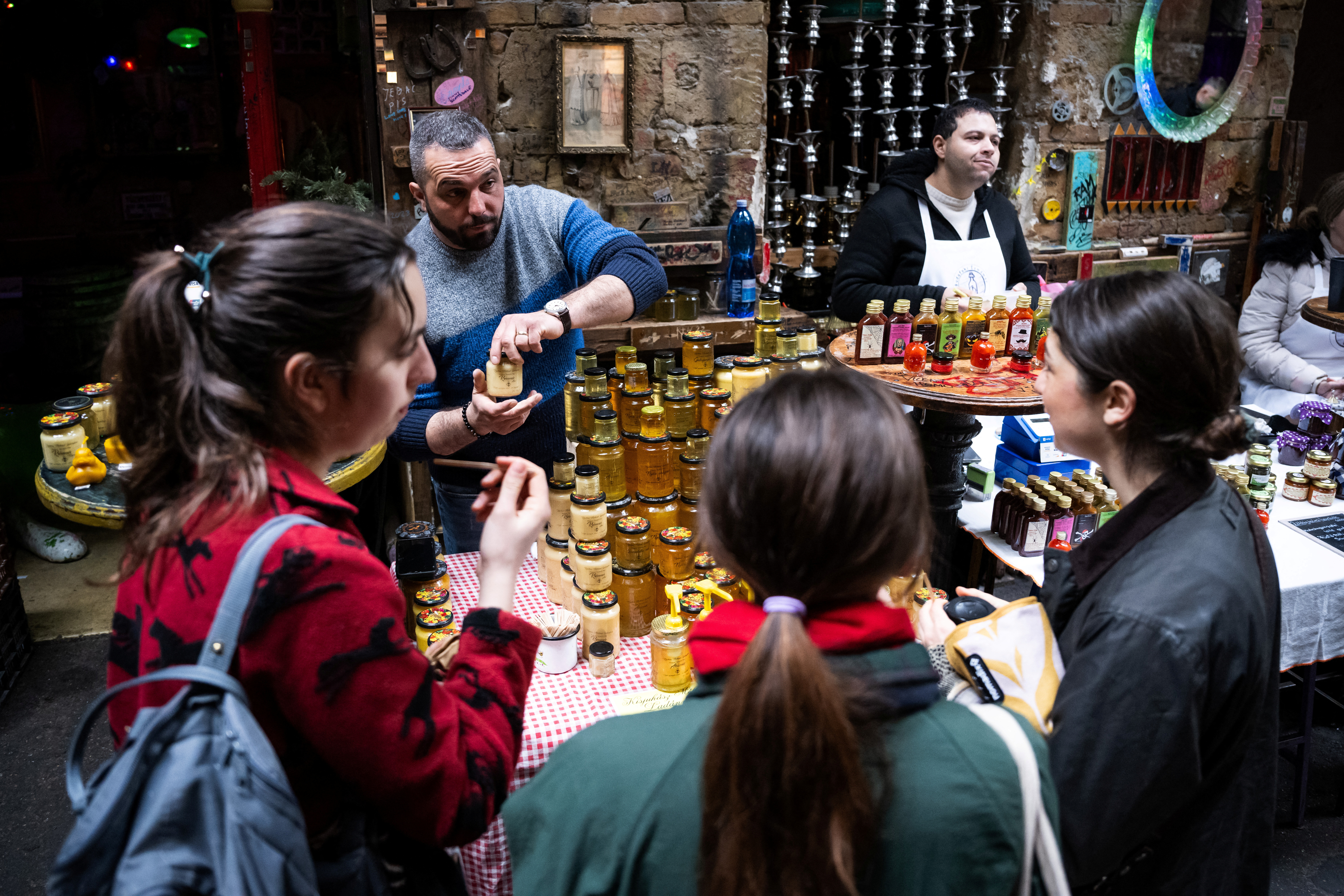 Beekeeper Krisztian Kisjuhasz, 41, sells his honey at a market in Budapest, Hungary, March 10