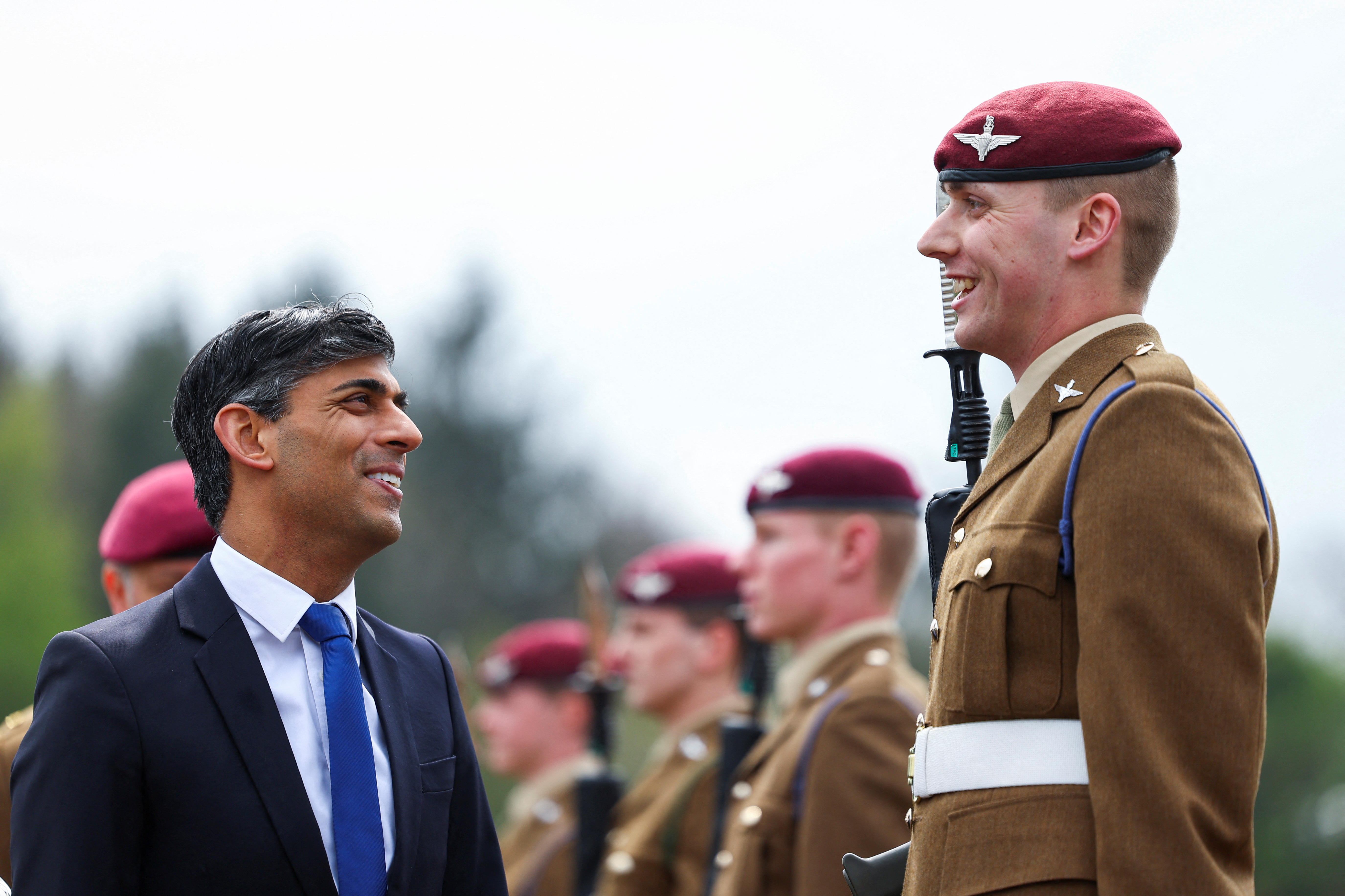 Britain's Prime Minister Rishi Sunak smiles as he inspects the Passing Out Parade of the Parachute Regiment recruits during his visit to the Helles Barracks at the Catterick Garrison