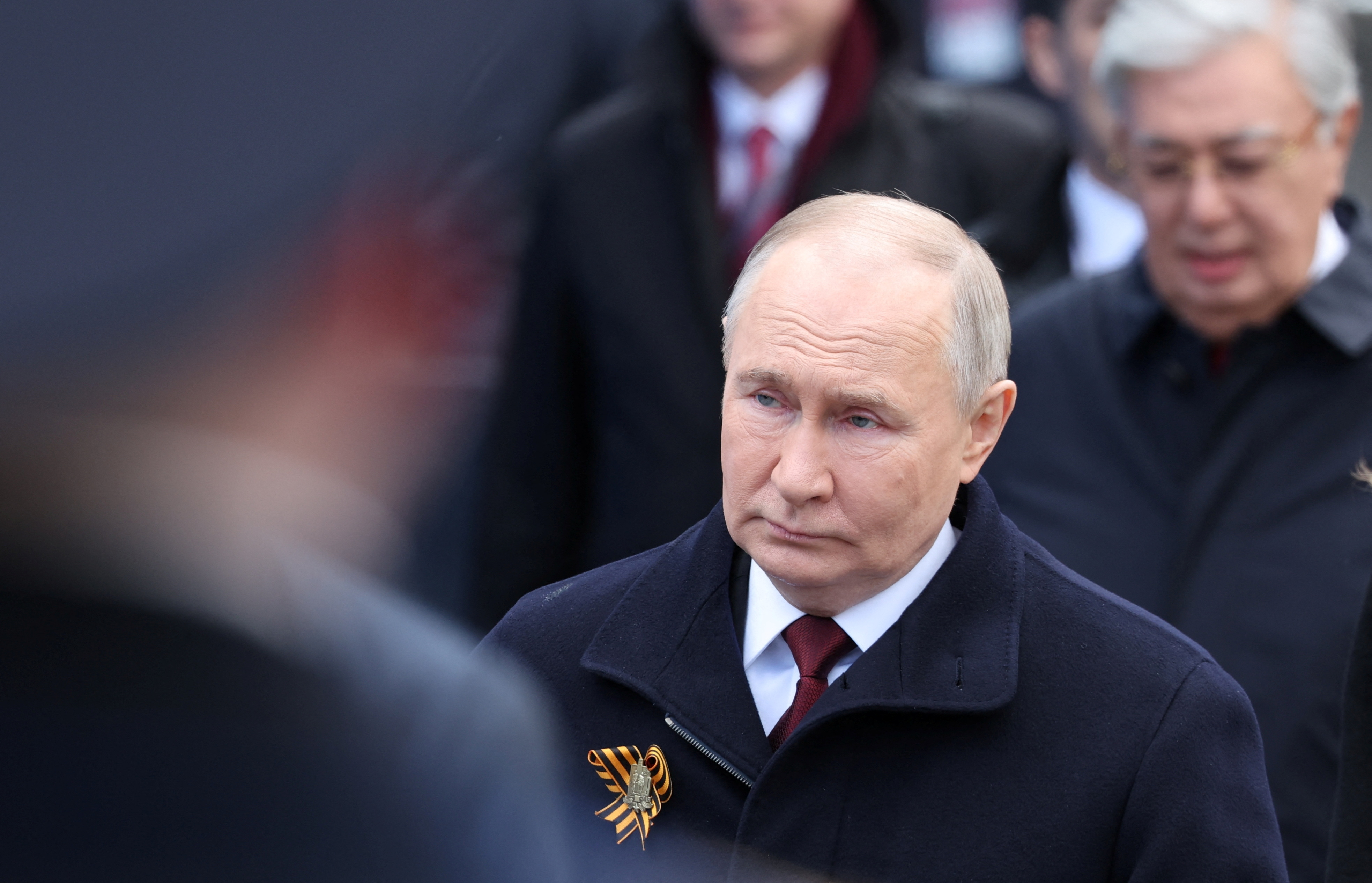 Russian President Vladimir Putin attends a military parade on Victory Day