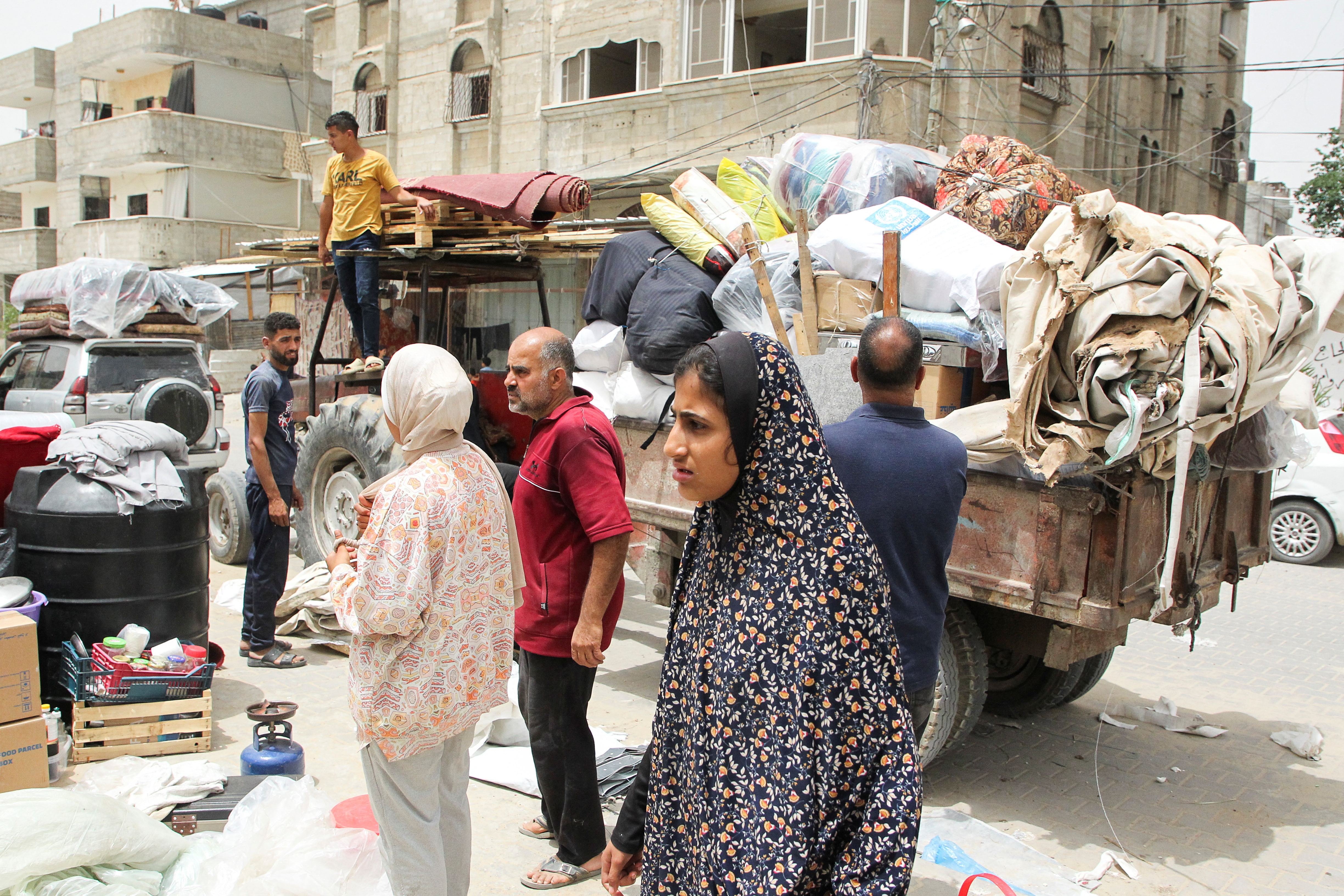 Palestinians prepare to evacuate, after Israeli forces launched a ground and air operation in the eastern part of Rafah, amid the ongoing conflict between Israel and Hamas, in Rafah, in the southern Gaza Strip, May 11