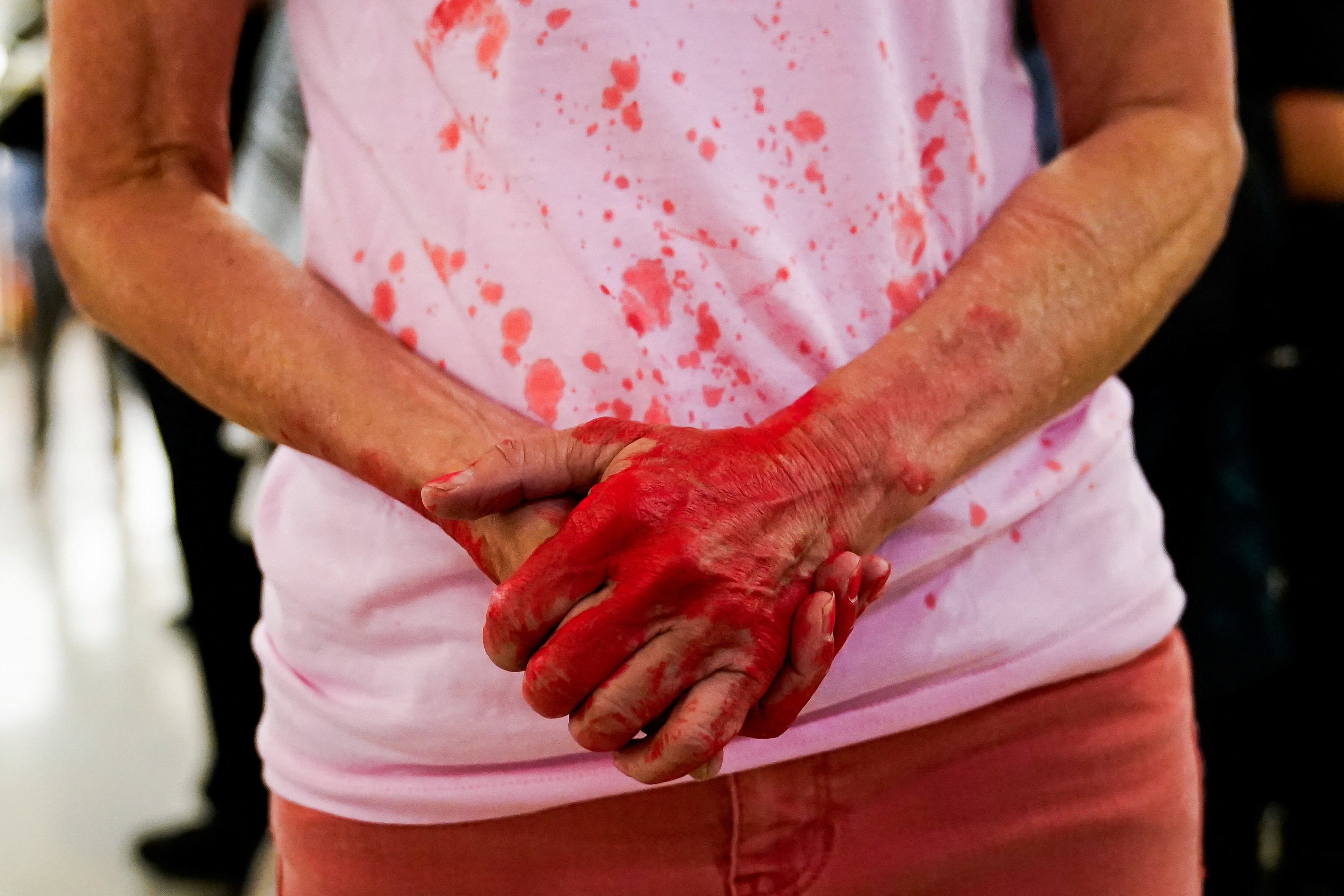 A pro-Palestinian protester lingers outside of a Senate Foreign Relations Committee hearing