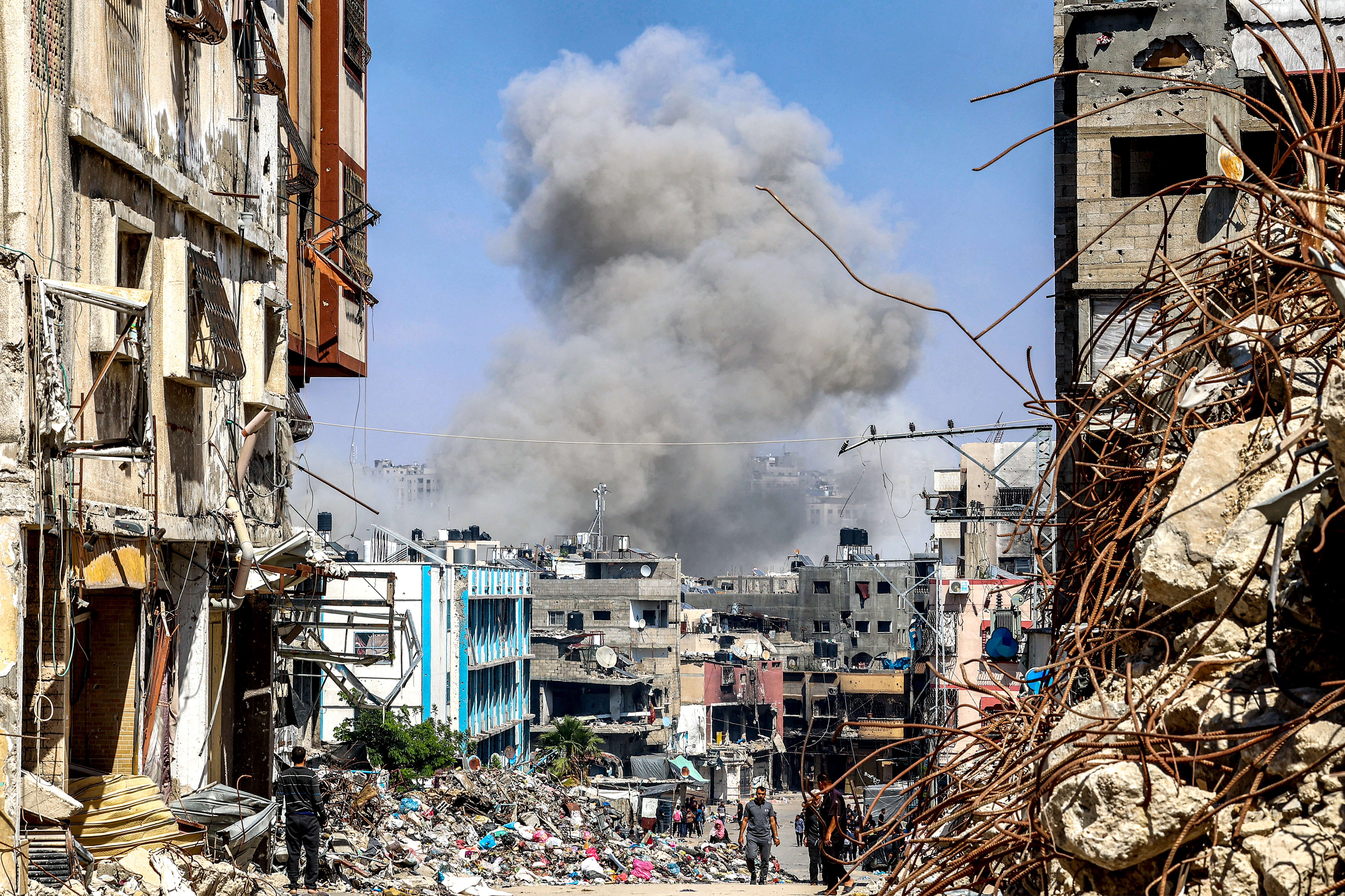 Plume of smoke rises during Israeli bombardment in Jabalia in the northern Gaza Strip on May 14, 2024