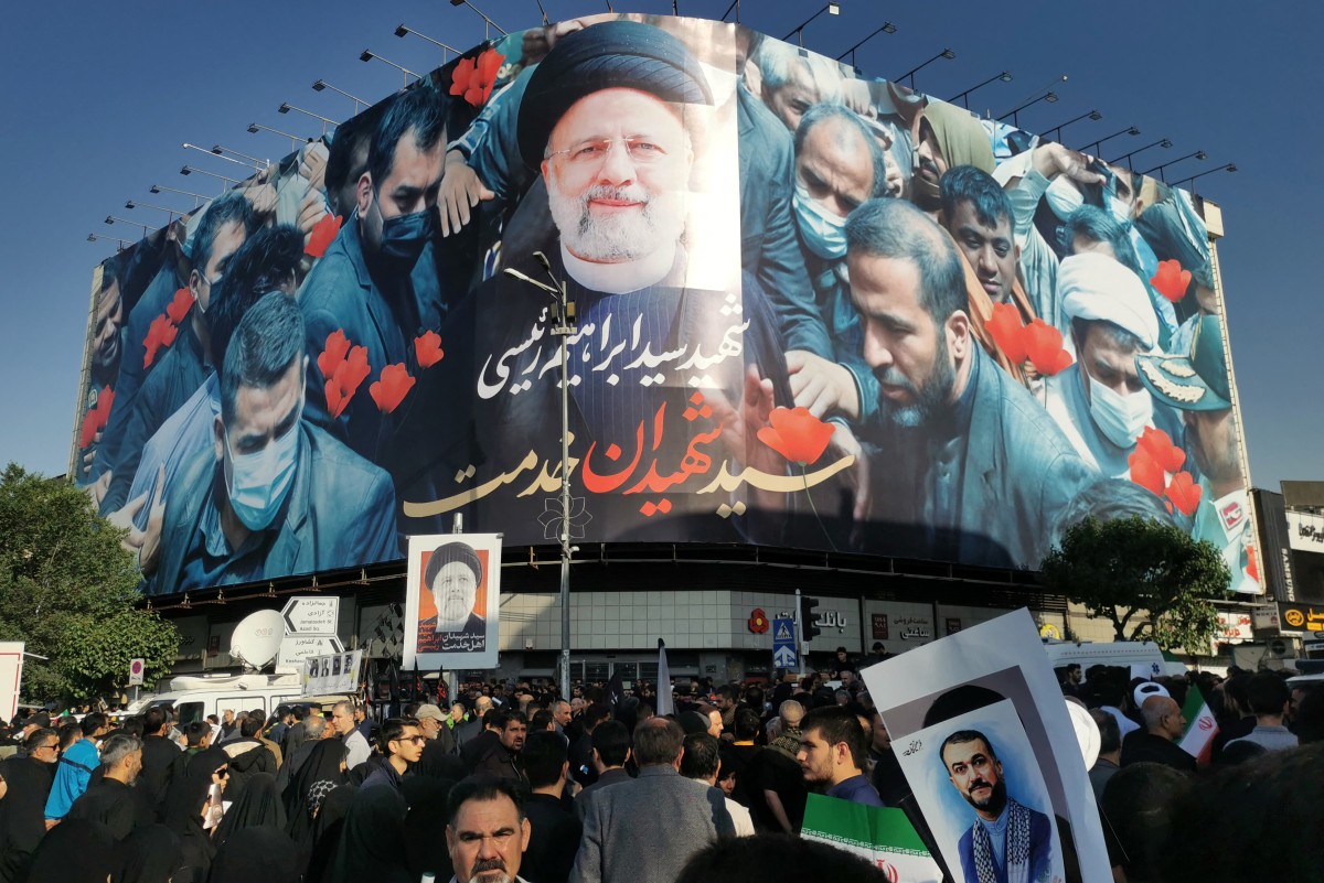 Mourners attend the funeral of Iranian President Ebrahim Raisi,