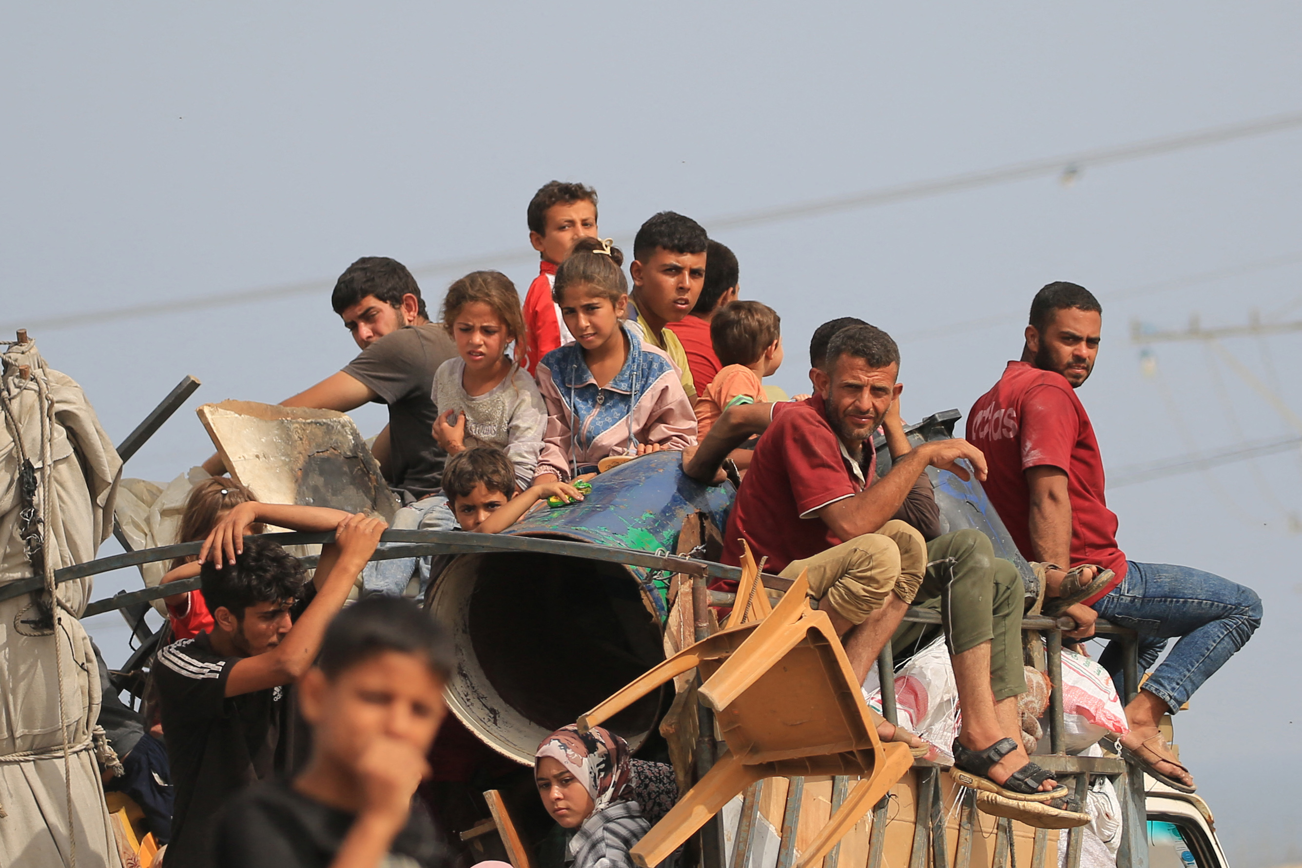 Palestinians flee the area of Tal al-Sultan in Rafah