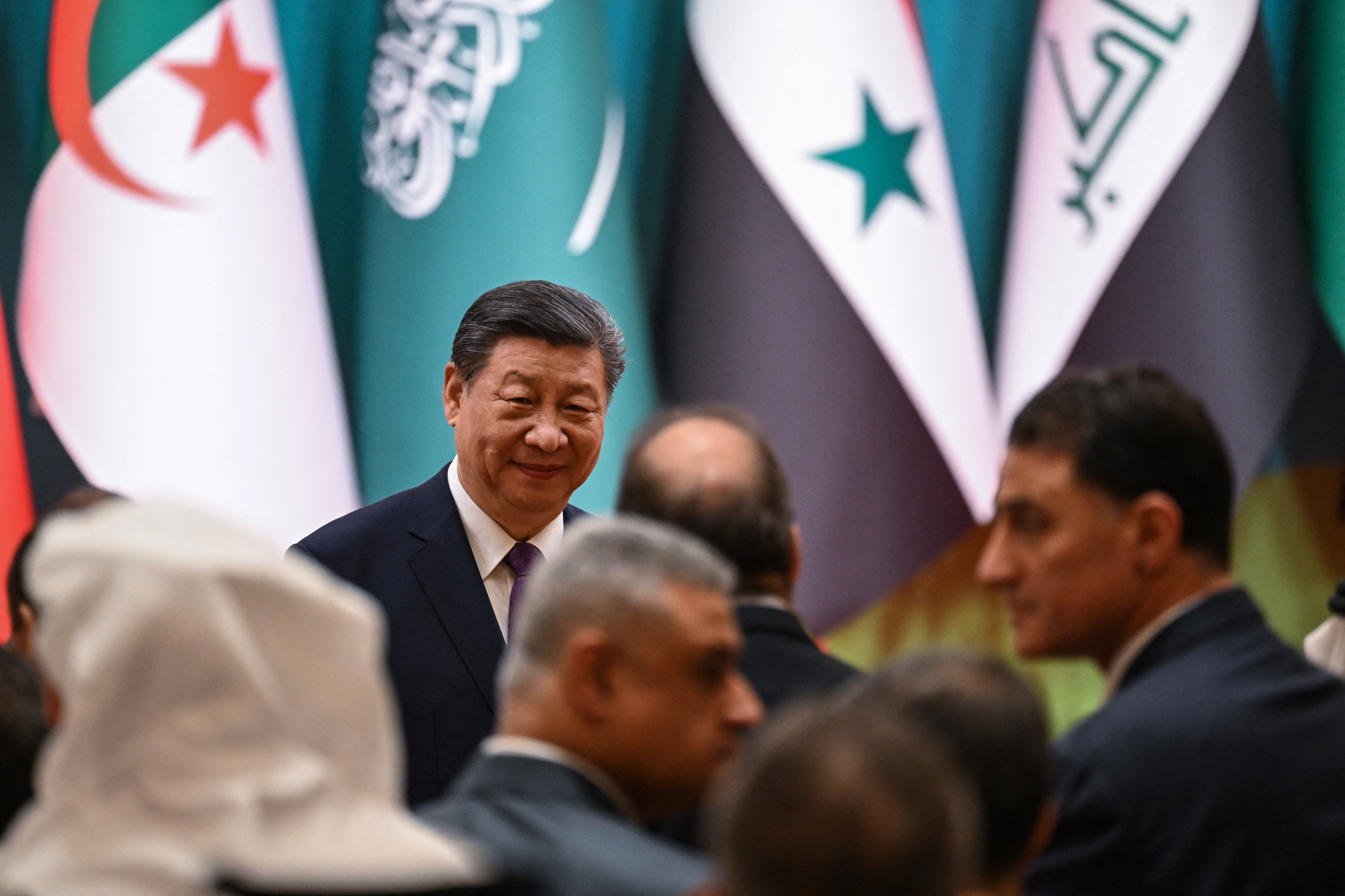 China's President Xi Jinping arrives for the opening ceremony of the 10th Ministerial Meeting of China-Arab States Cooperation Forum at the Diaoyutai State Guesthouse in Beijing