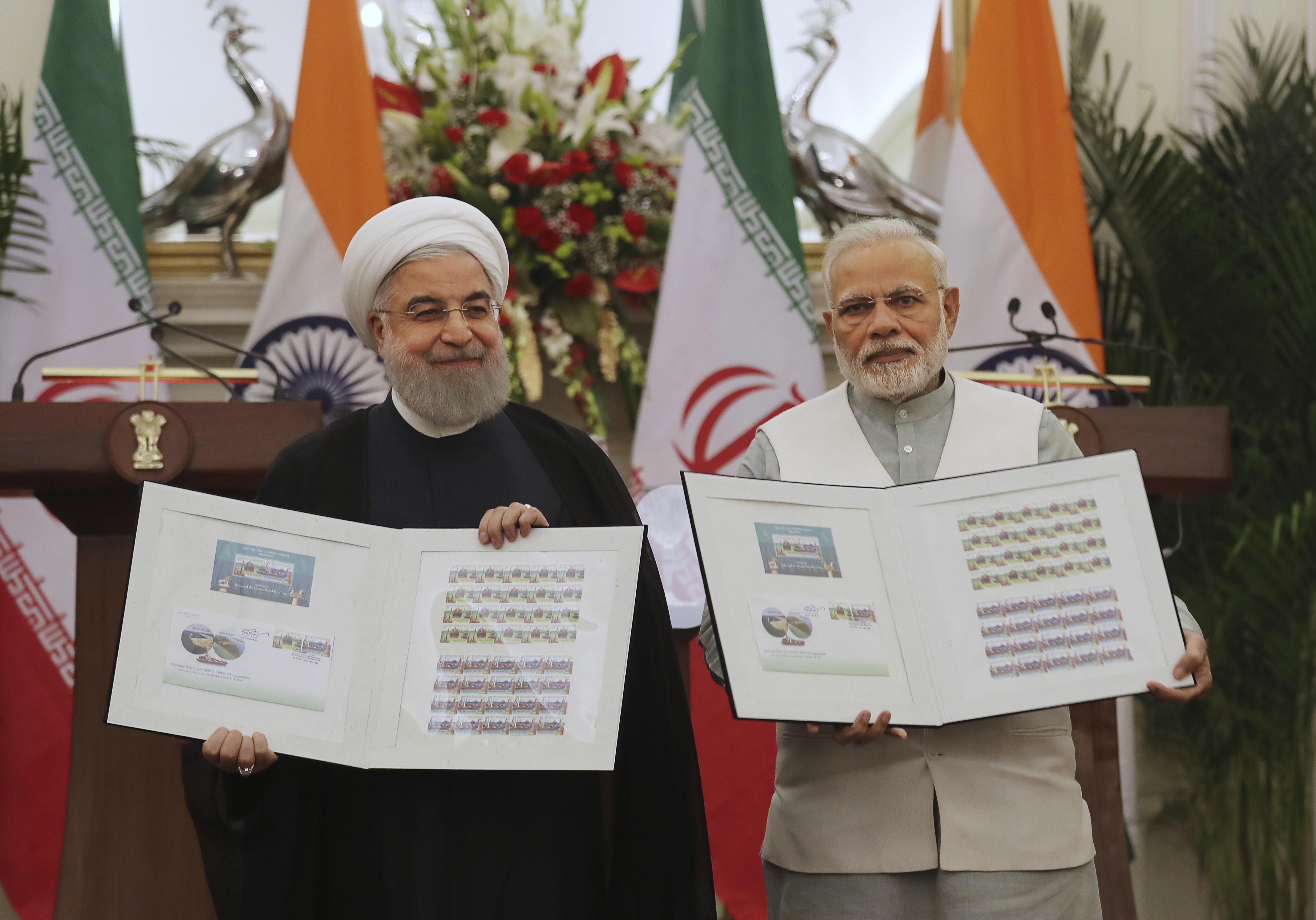 Modi and Rouhani sign trade agreements in India