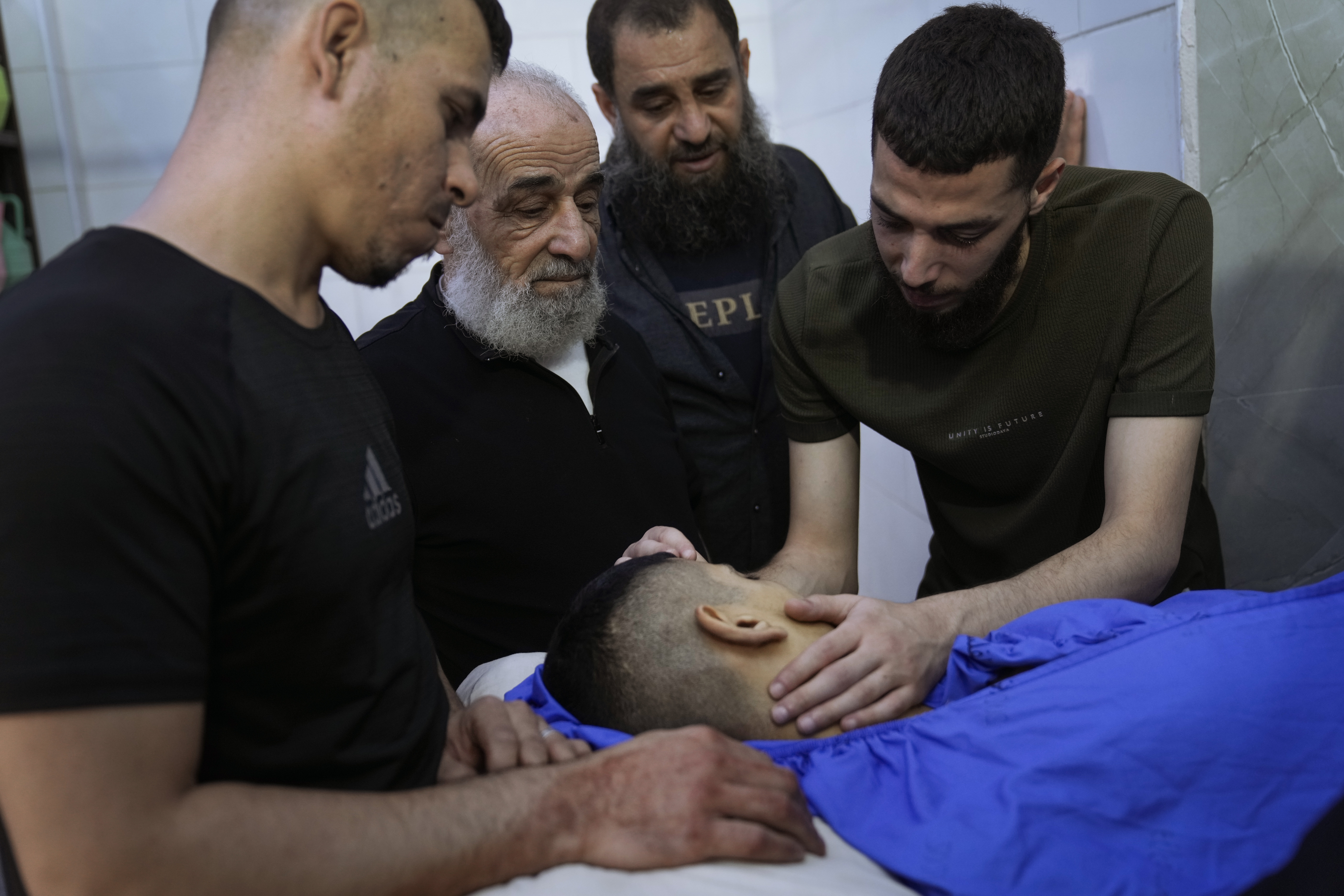 Palestinians grieve the death of Amir Abu Amireh, who was killed in a military raid on Jenin, West Bank. 