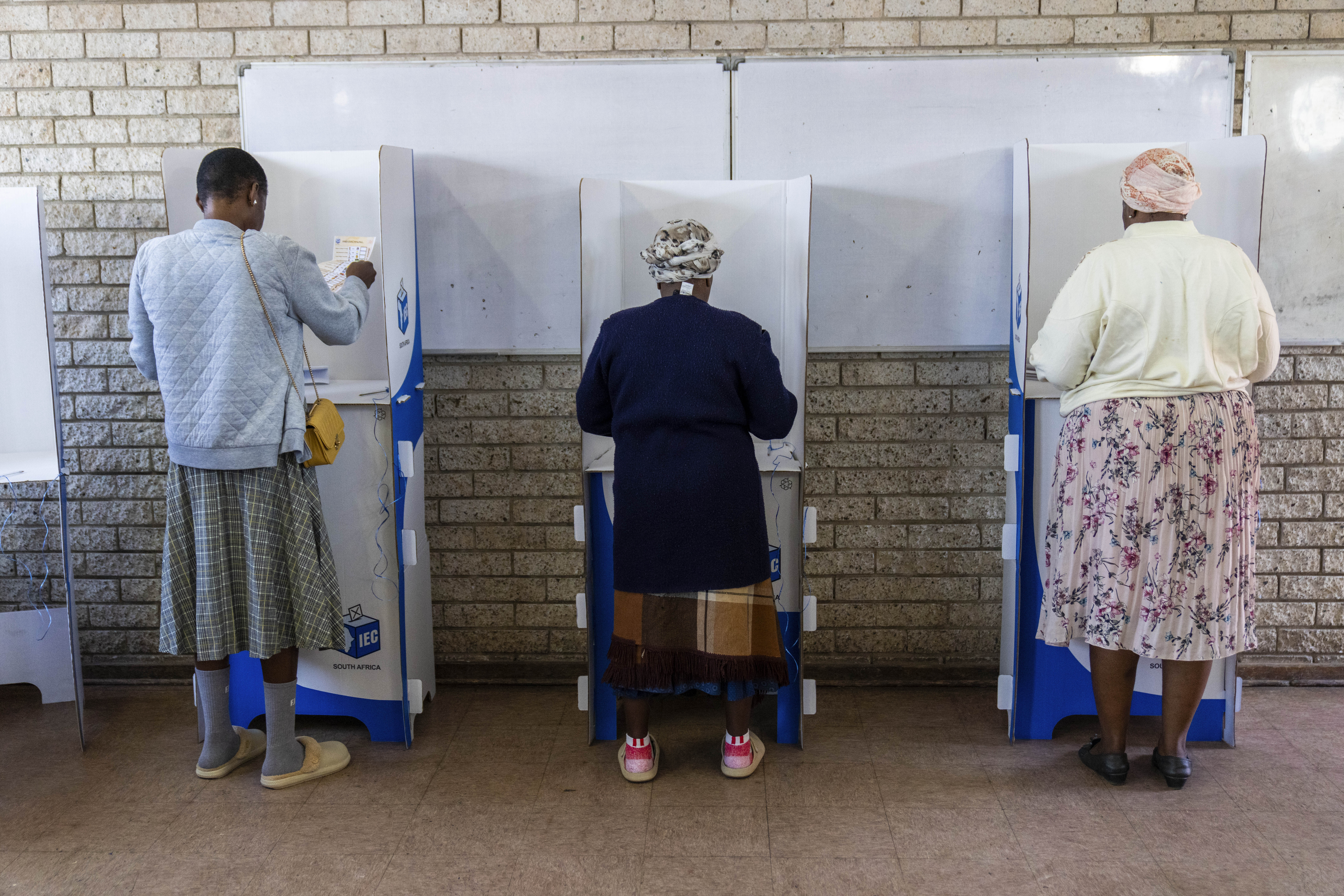 Voters prepare to cast their ballot