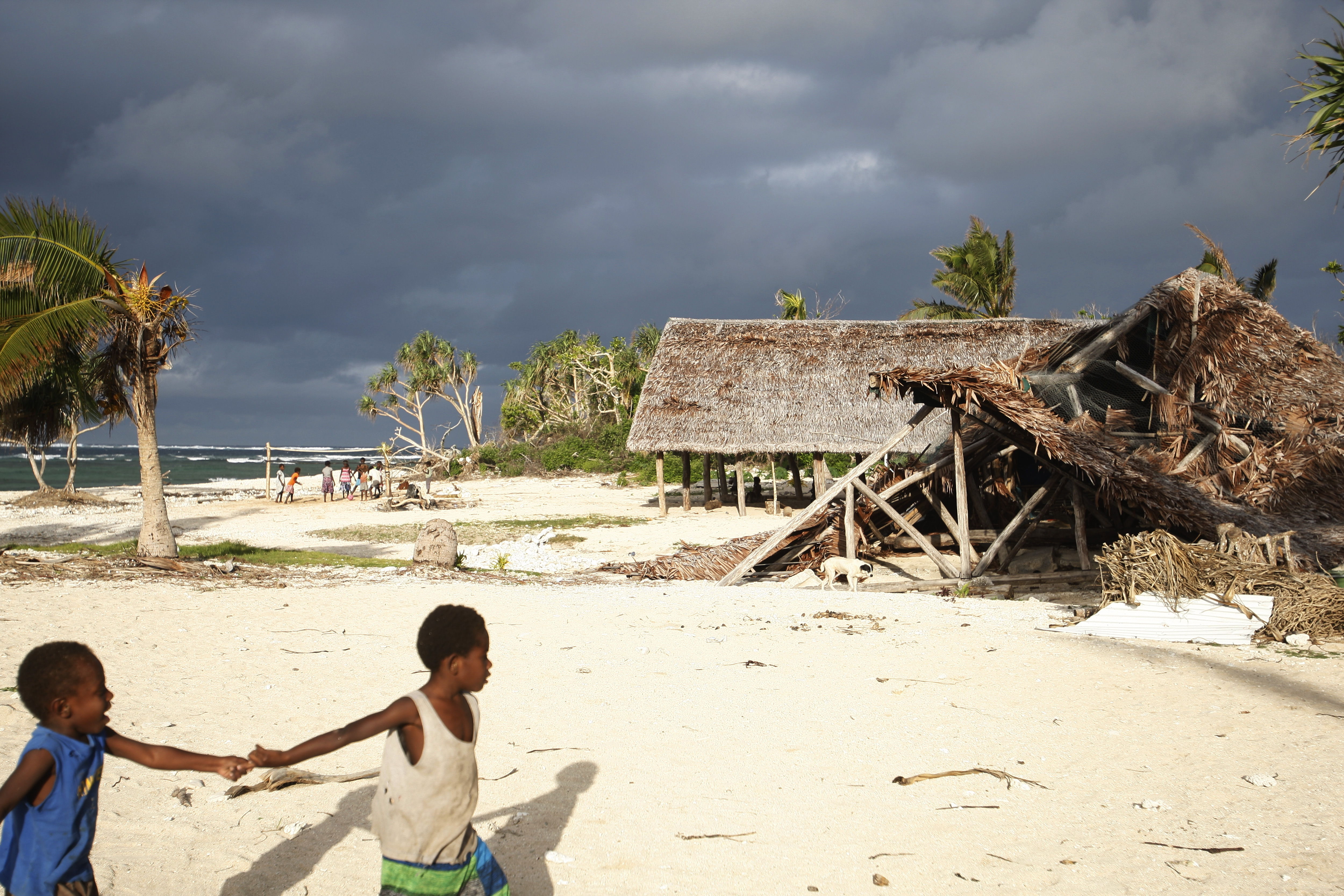 Vanuatu, one of the countries to bring the case, was hit by two Category 4 cyclones within 24 hours of each other in March last year [File: Nick Perry/AP]
