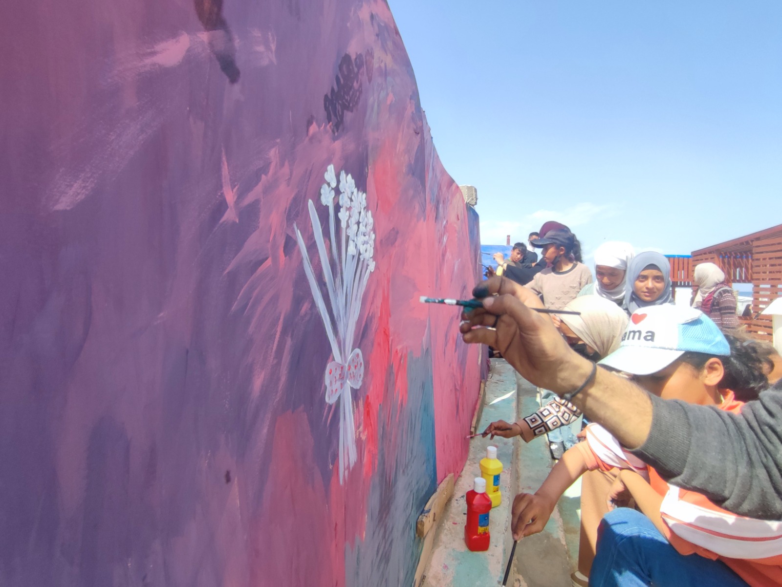 “I feel that [the children’s] integration, love, and awareness of the importance of what they do greatly alleviates the difficulties of displacement and supports them psychologically,” says one of the facilitators of the cultural sessions.