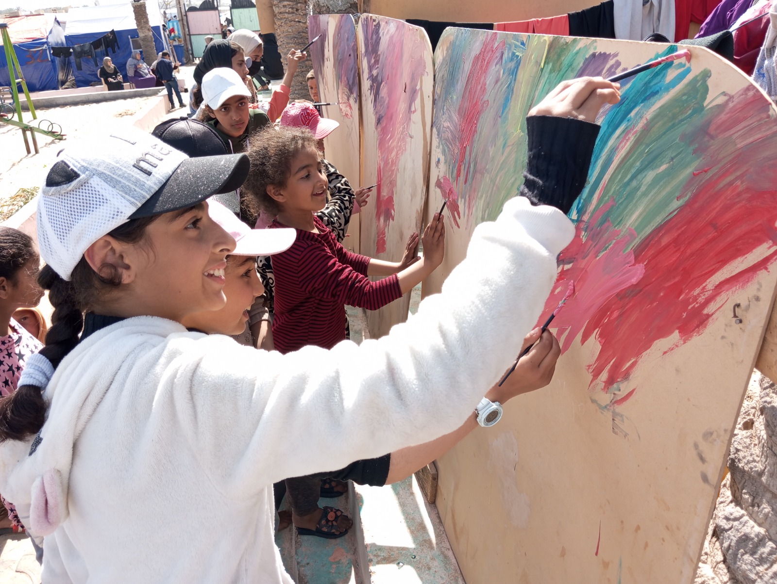 Buthaina Al-Faqawi, a community mobiliser for the Culture and Free Thought Association, describes the change in the children’s demeanour she witnesses when they join the art classes: “The first look is despair and misery. The second look is hope. The third look is love of life and childhood. Please...we deserve life, we deserve better."