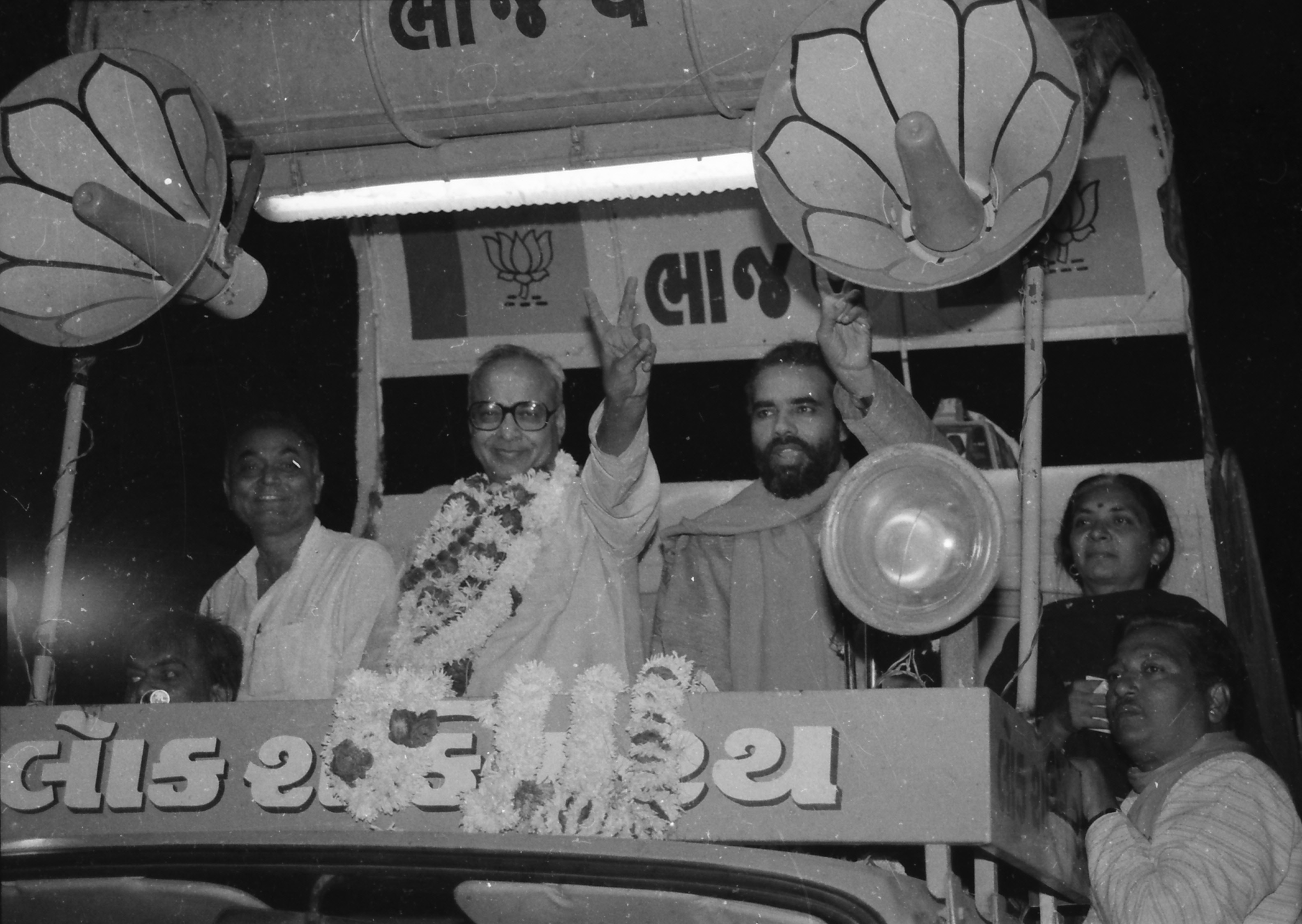 Narendra Modi (Prime Miniser of India) Sankersinh Vaghela (Ex Chief Minister of Gujarat) and Anandiben Patel (Ex Chief Minister of Gujarat) on Lok Shakti rath in Ahmedabad Gujarat India on 6th December 1989.