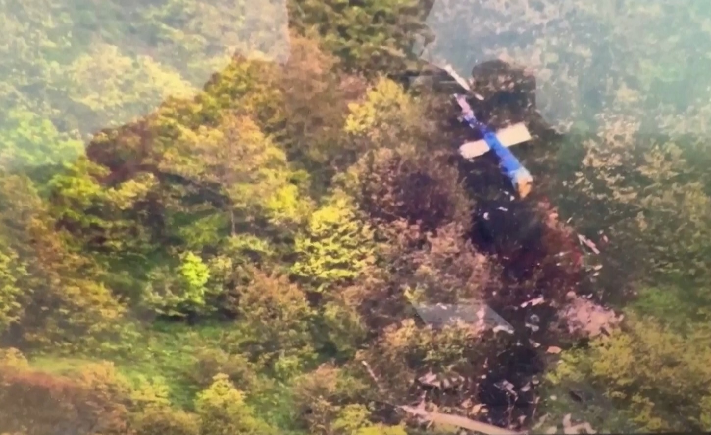 Footage obtained from Iranian media on Monday showed President Raisi's helicopter at the crash site on a mountainside.
