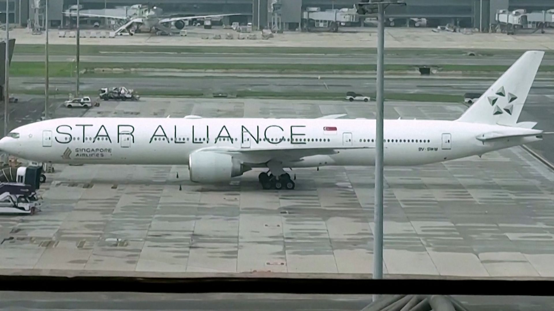 Still of Singapore Airlines aircraft landing.