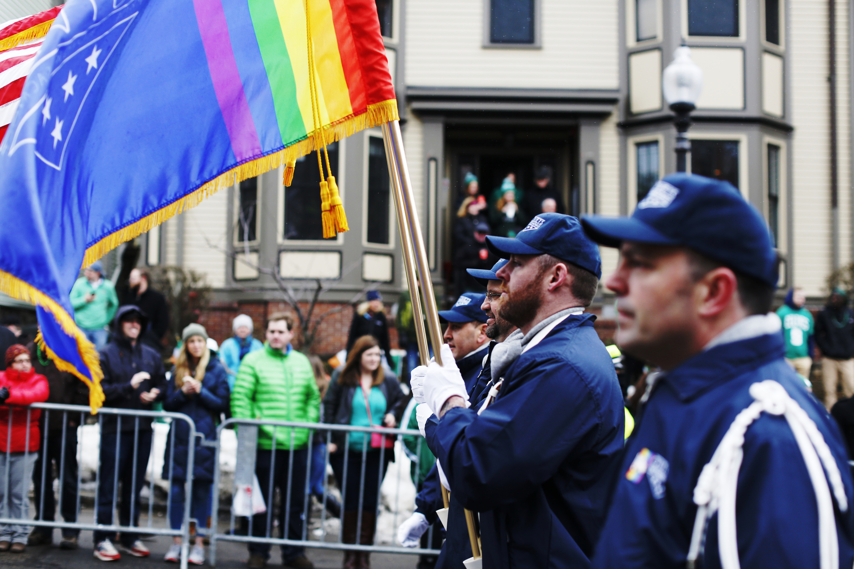The color guard for LGBT veterans group OutVets marches down Broadway during the St. Patrick's Day Parade in South Boston