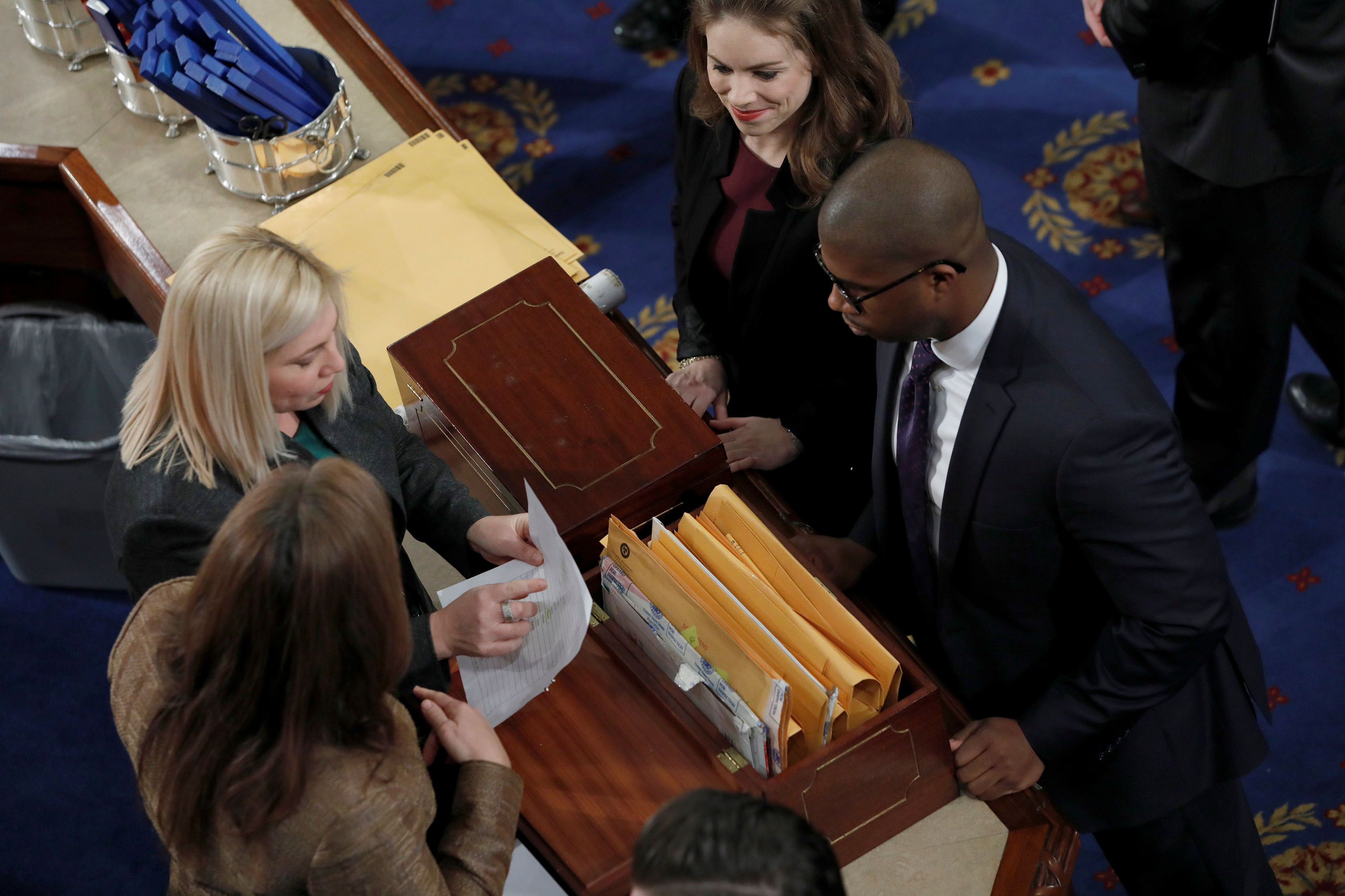 Congress staff open cases containing Electoral College votes in 2017