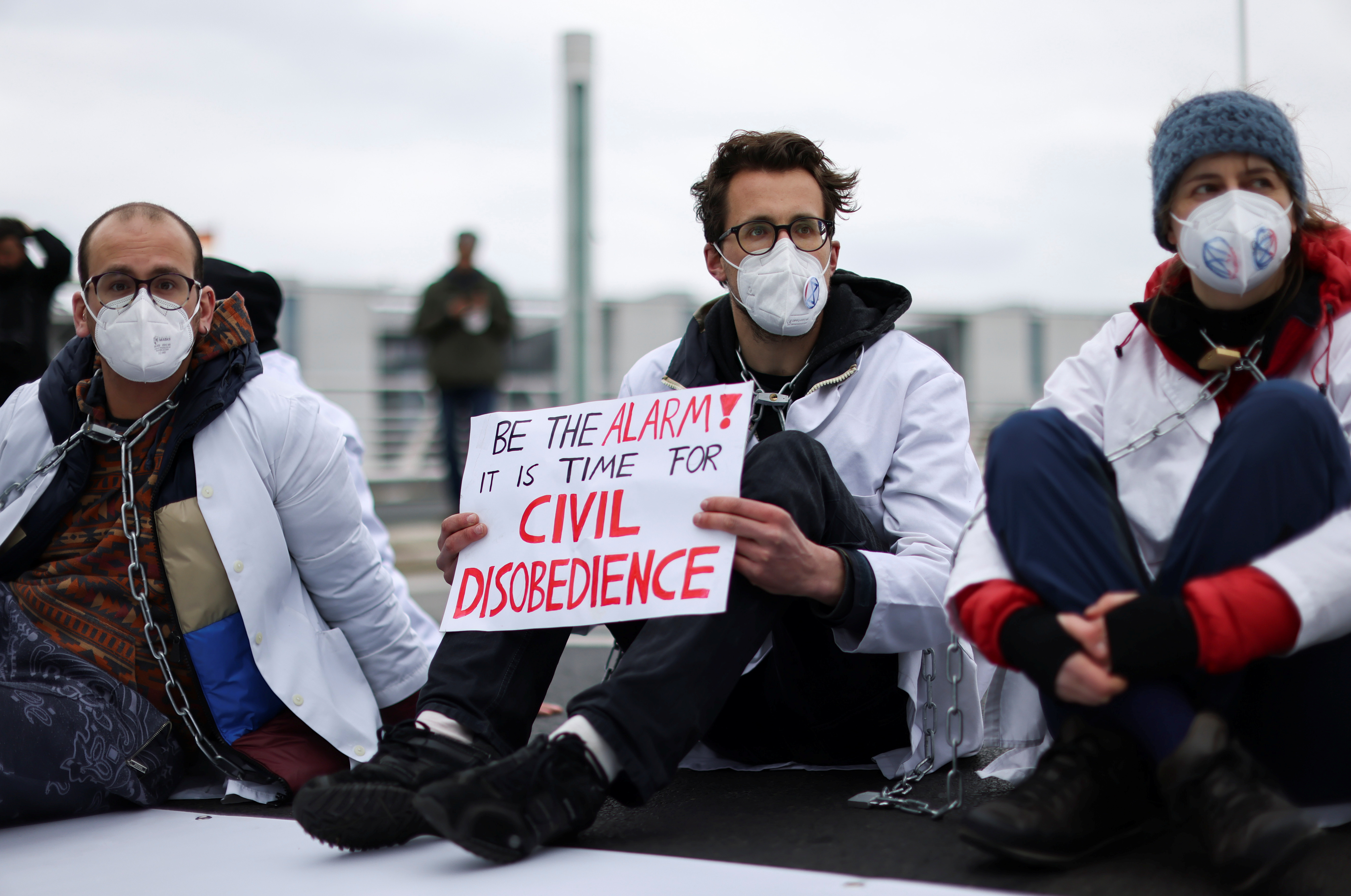 Activists from the Scientist Rebellion climate change group block a bridge in central Berlin, Germany, April 6, 2022. REUTERS/Christian Mang