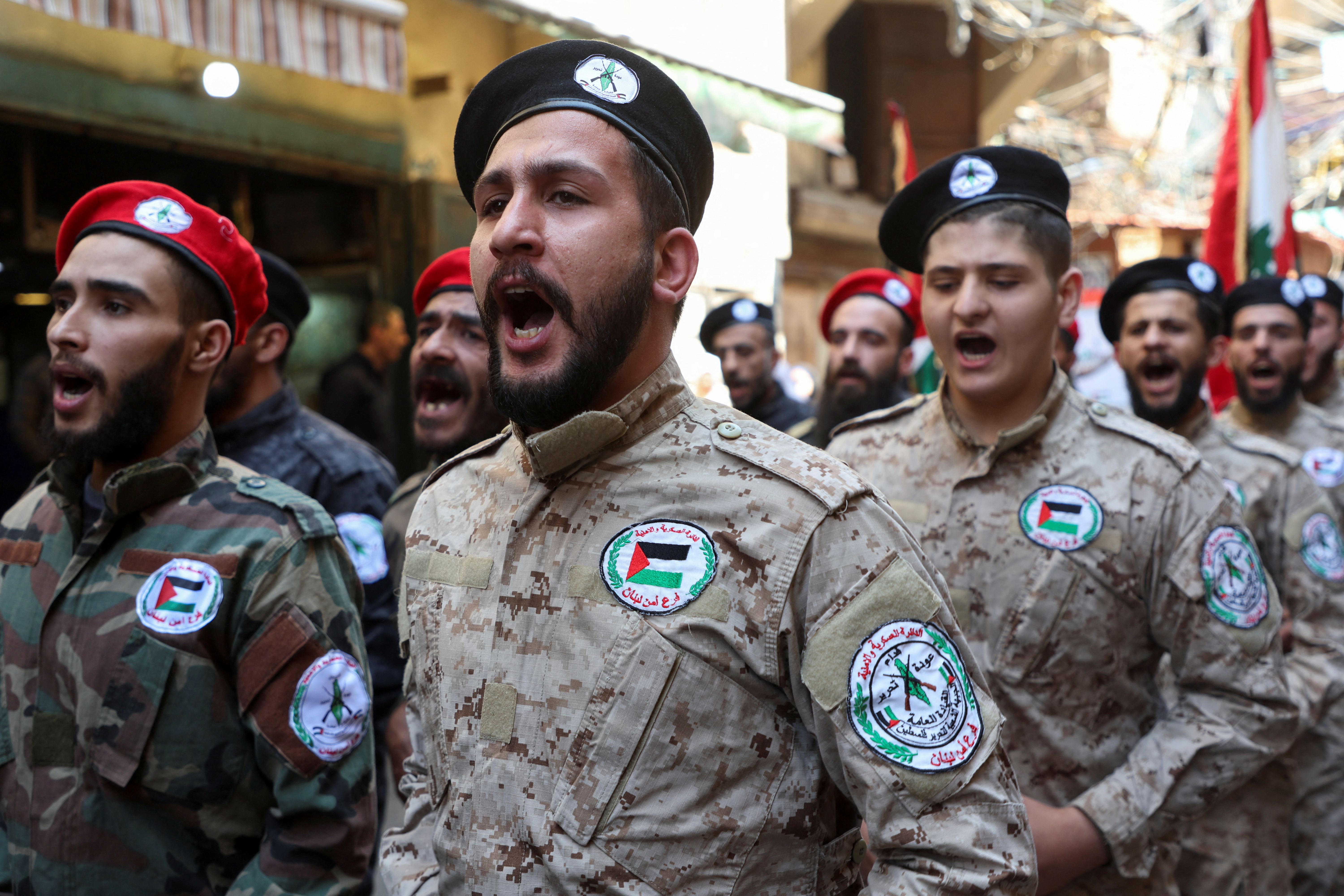 Members of the Popular Front for the Liberation of Palestine-General Command (PFLP-GC) march during a parade marking the annual al-Quds Day, (Jerusalem Day), at Burj al-Barajneh Palestinian refugee camp in Beirut, Lebanon