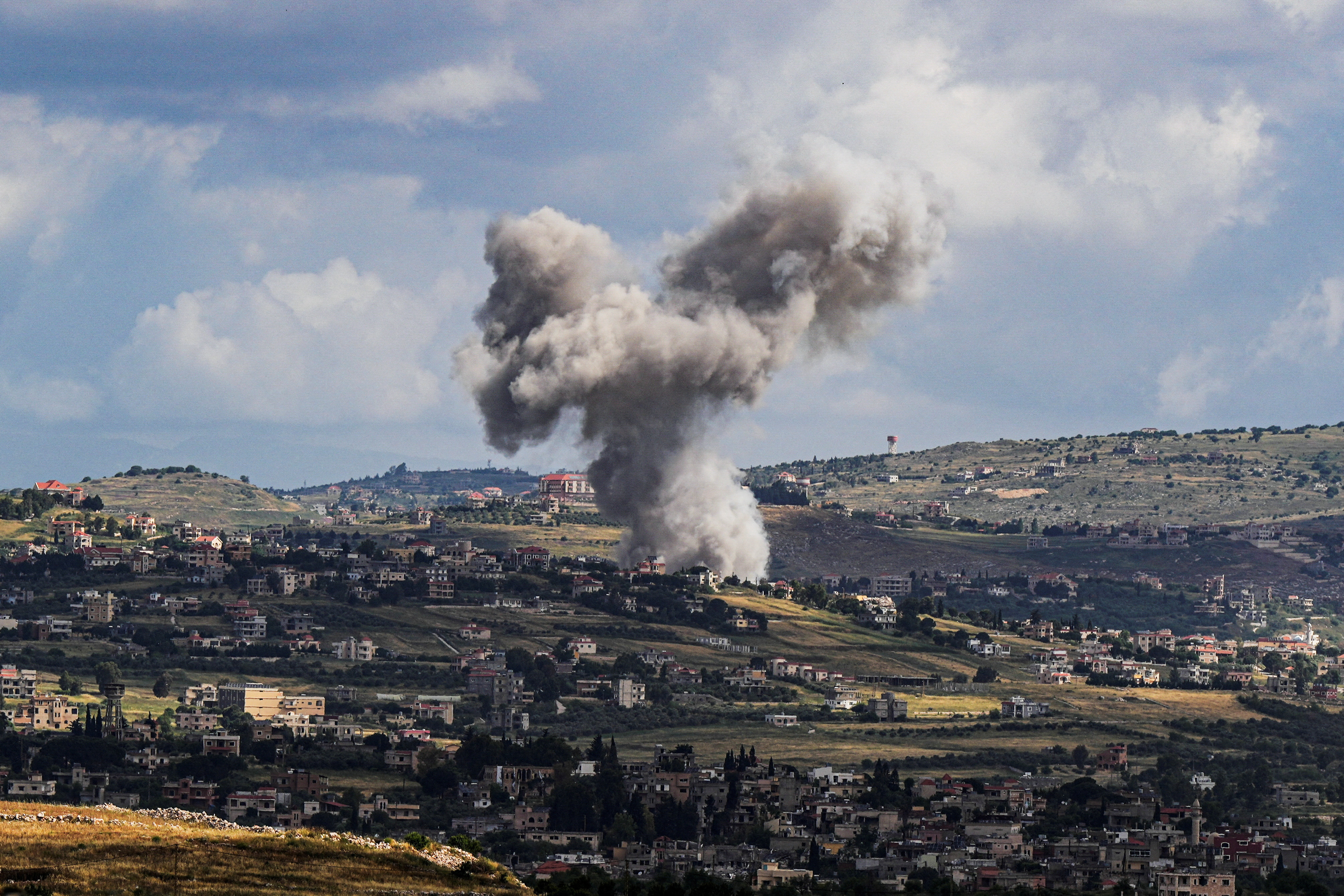 FILE PHOTO: Smoke rises above Lebanon, following an Israeli strike, amid ongoing cross-border hostilities between Hezbollah and Israeli forces, as seen from Israel's border with Lebanon in northern Israel, May 5, 2024. REUTERS/Ayal Margolin ISRAEL OUT. NO COMMERCIAL OR EDITORIAL SALES IN ISRAEL/File Photo