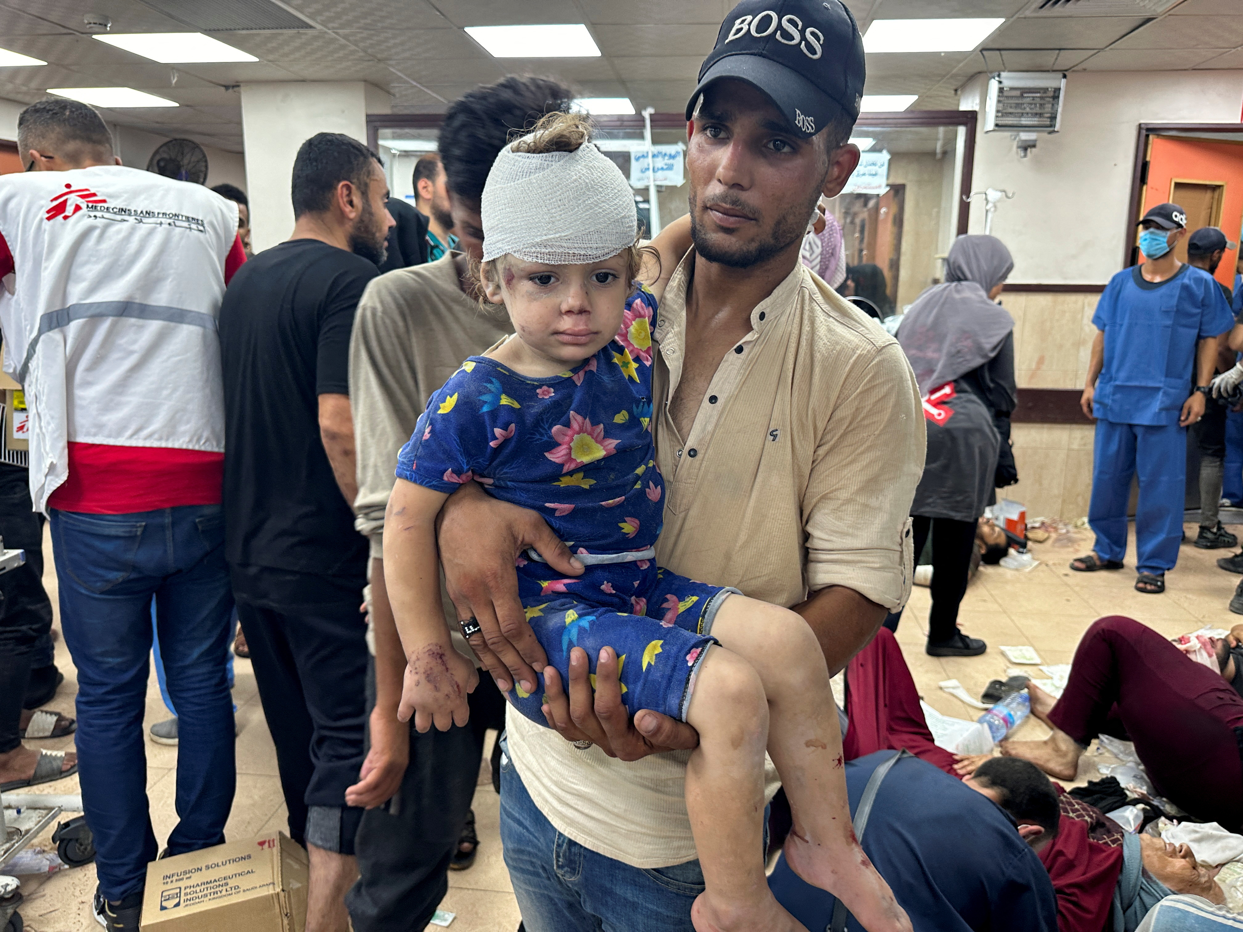 An injured child looks on at Al-Aqsa Martyrs Hospital, in the aftermath of an Israeli strike, amid the Israel-Hamas conflict, in Deir Al-Balah, in the central Gaza Strip, June 8