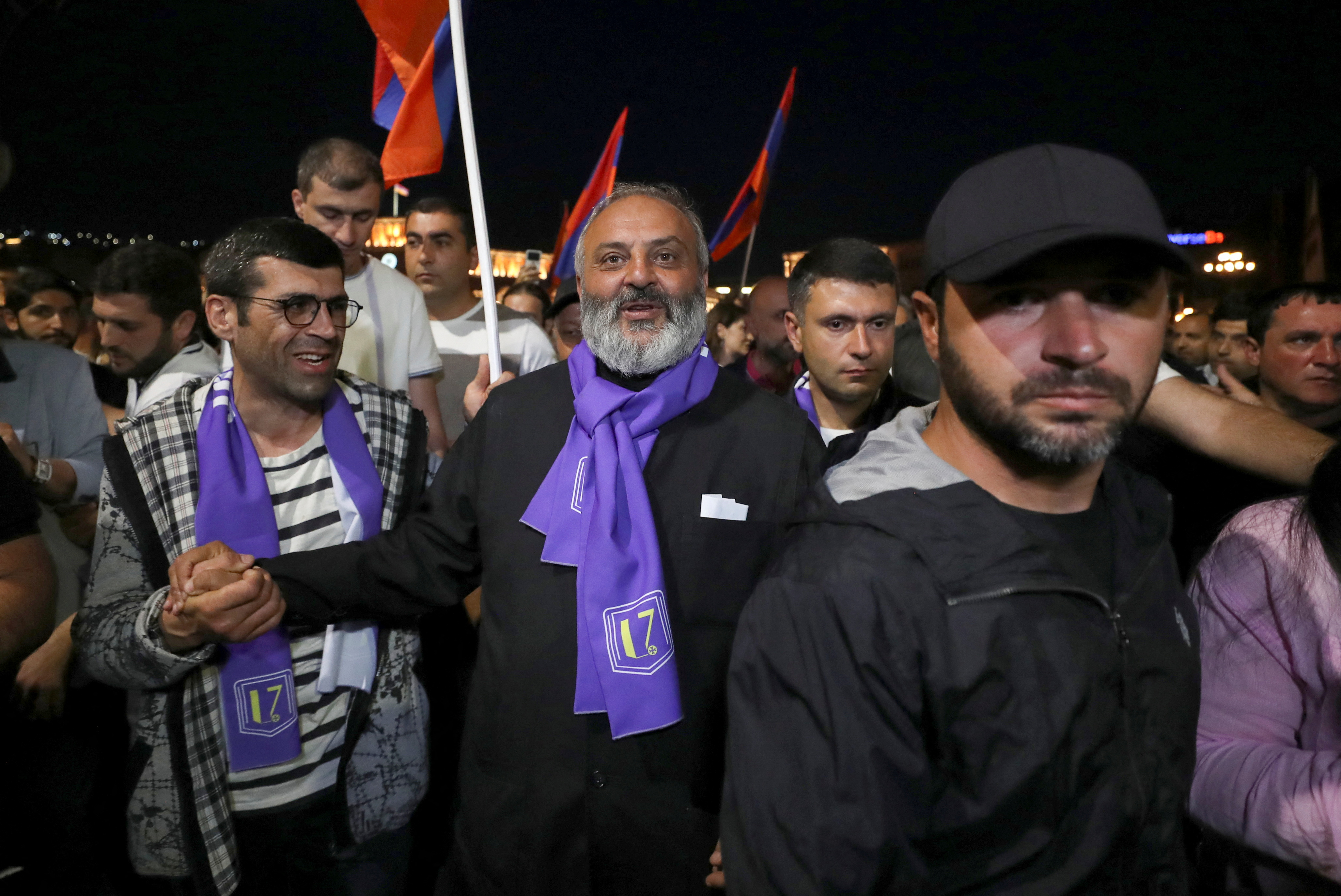 Archbishop Bagrat Galstanyan greets his supporters during a protest against Armenian Prime Minister Nikol Pashinyan