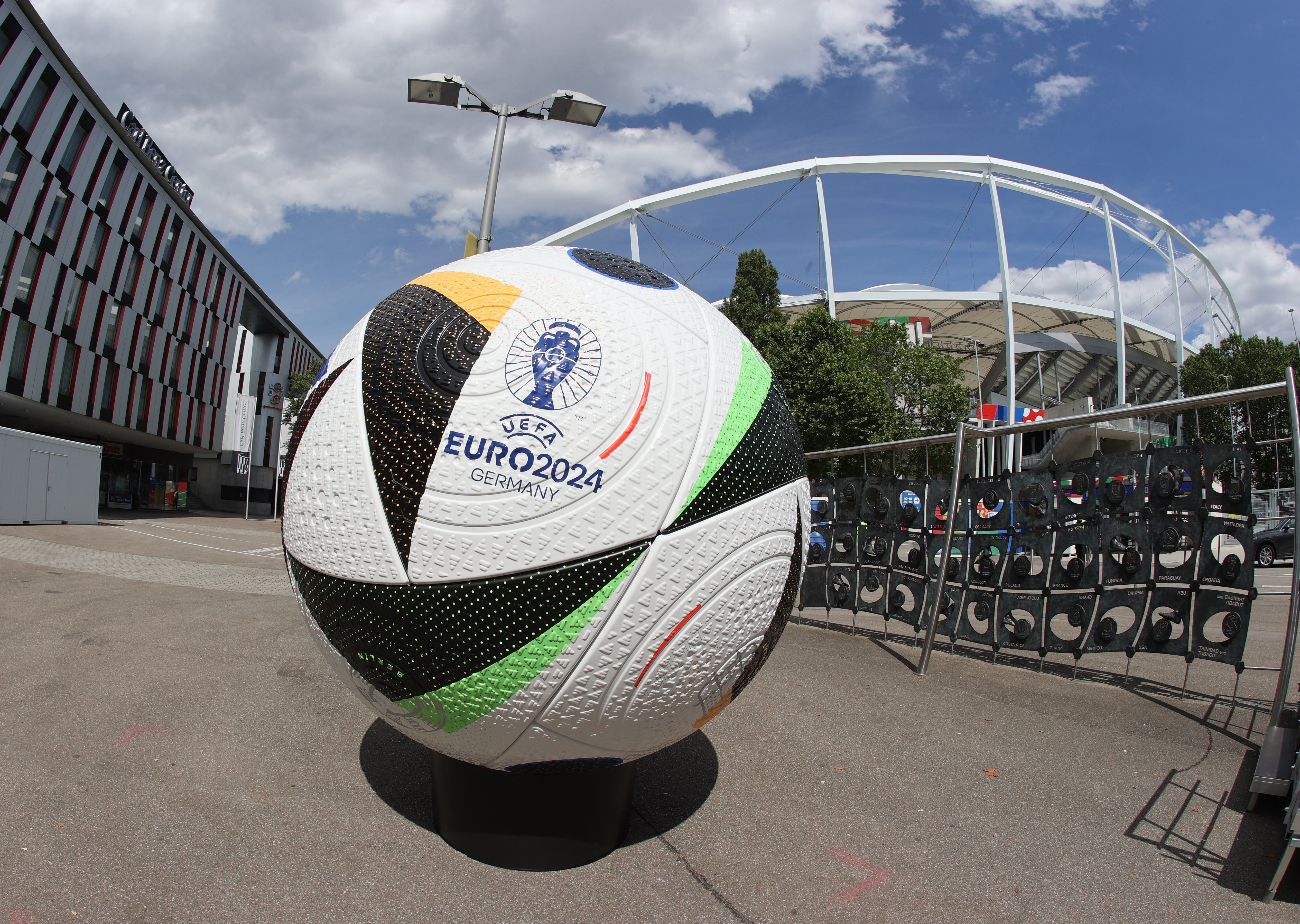 Football on display outside stadium.
