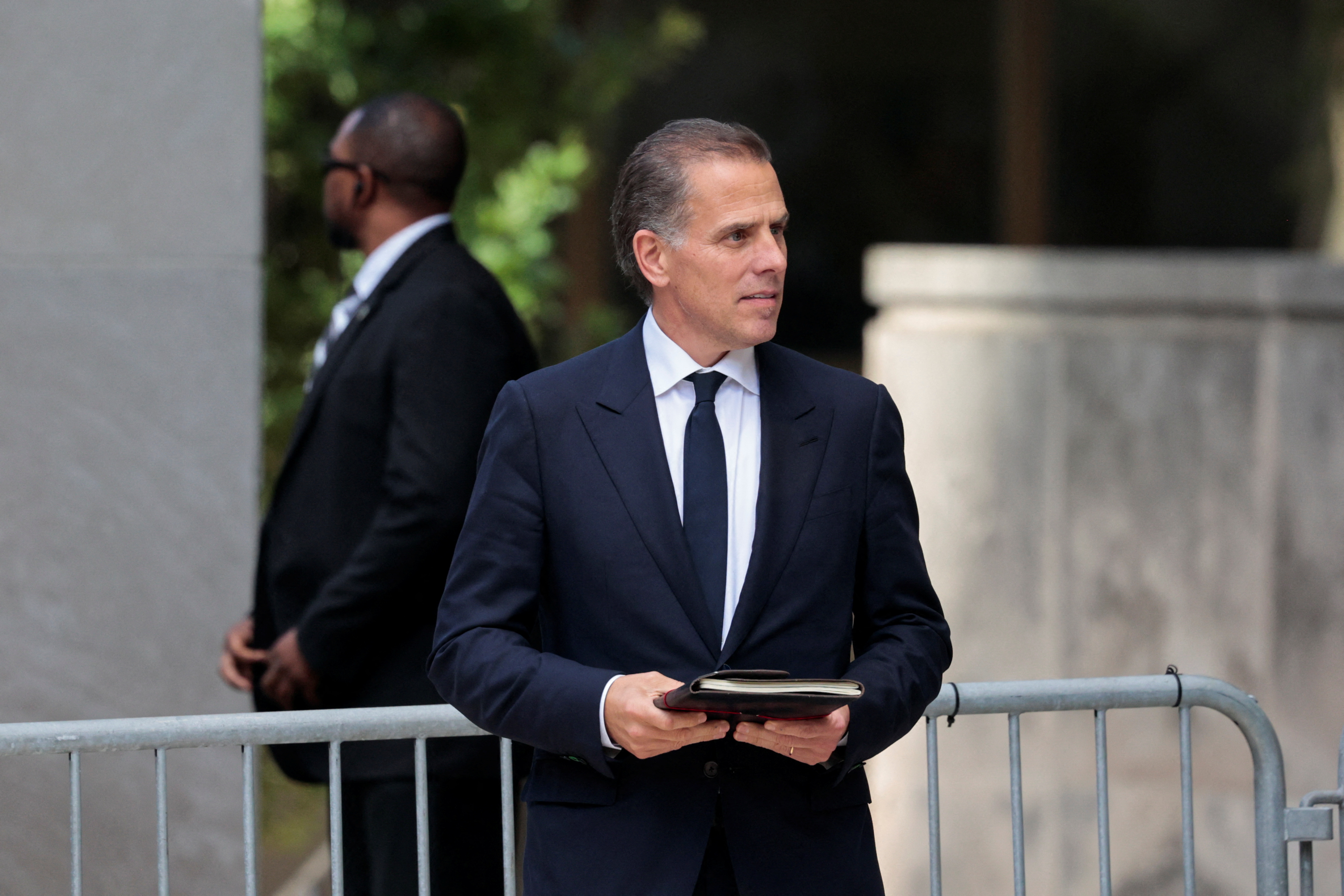 Hunter Biden, son of U.S. President Joe Biden, walks outside the federal court on the day of his trial on criminal gun charges