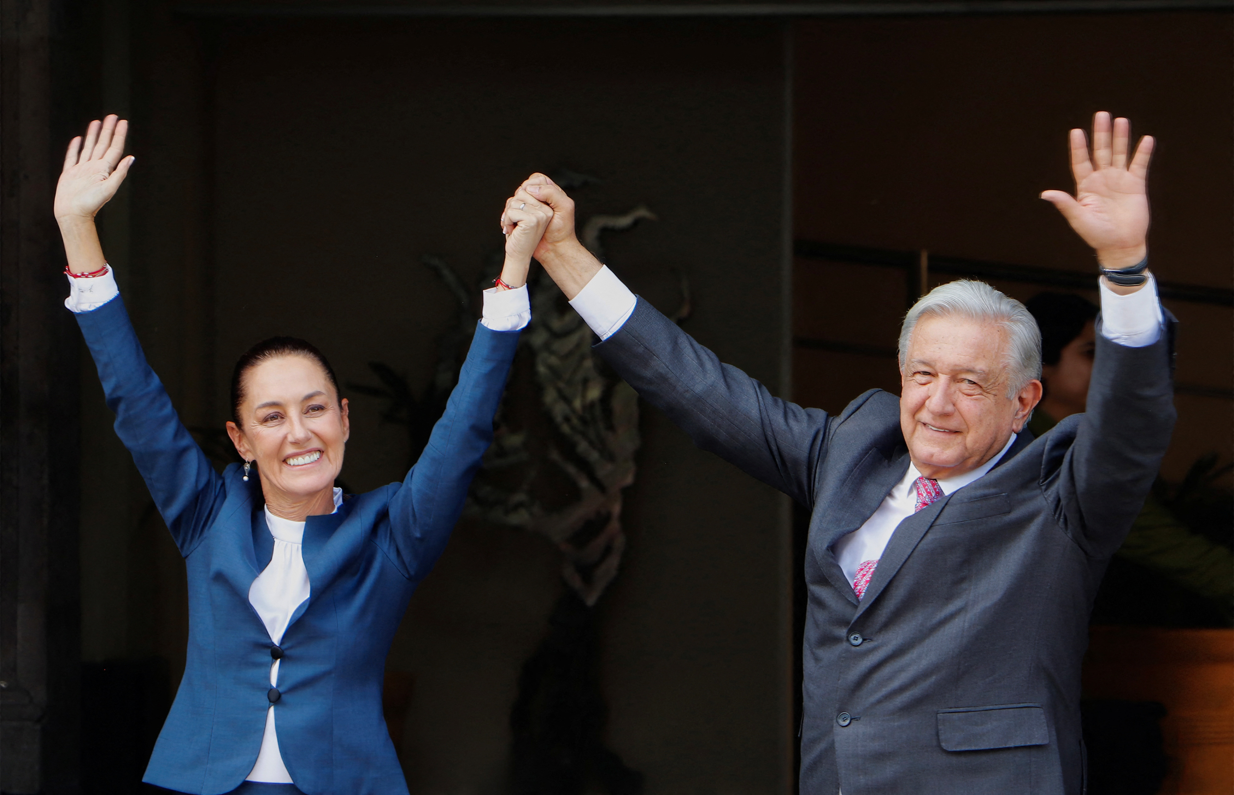 Mexico's President Andres Manuel Lopez Obrador and president-elect Claudia Sheinbaum gesture after Sheinbaum arrived to the National Palace for a private meeting, in Mexico City, Mexico June 10, 2024. Mexico Presidency/Handout via REUTERS ATTENTION EDITORS - THIS IMAGE HAS BEEN SUPPLIED BY A THIRD PARTY. NO RESALES. NO ARCHIVES.