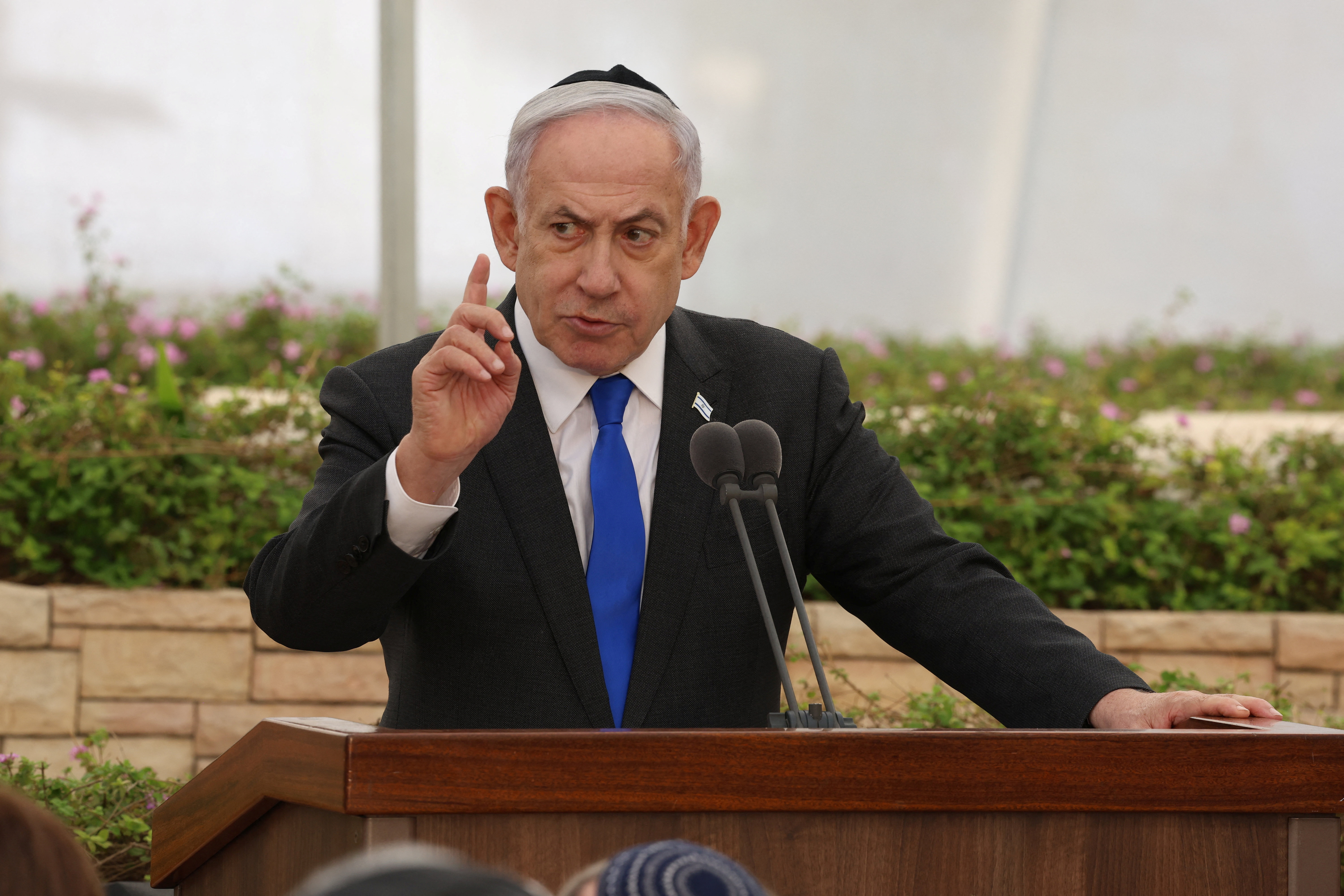 Israeli Prime Minister Benjamin Netanyahu attends the state memorial ceremony for the Altalena martyrs at the Nachalat Yitzhak cemetery in Givatayim, Israel, on 18 June 2024. [Shaul Golan/Reuters]