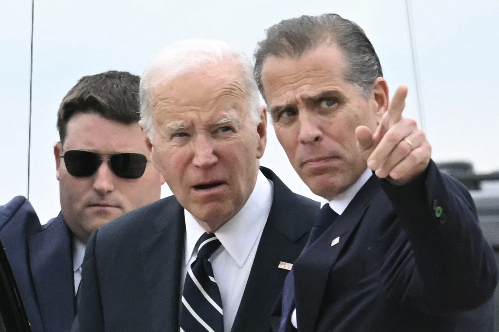 US President Joe Biden talks with his son Hunter Biden upon arrival at Delaware Air National Guard Base in New Castle, Delaware, on June 11, 2024