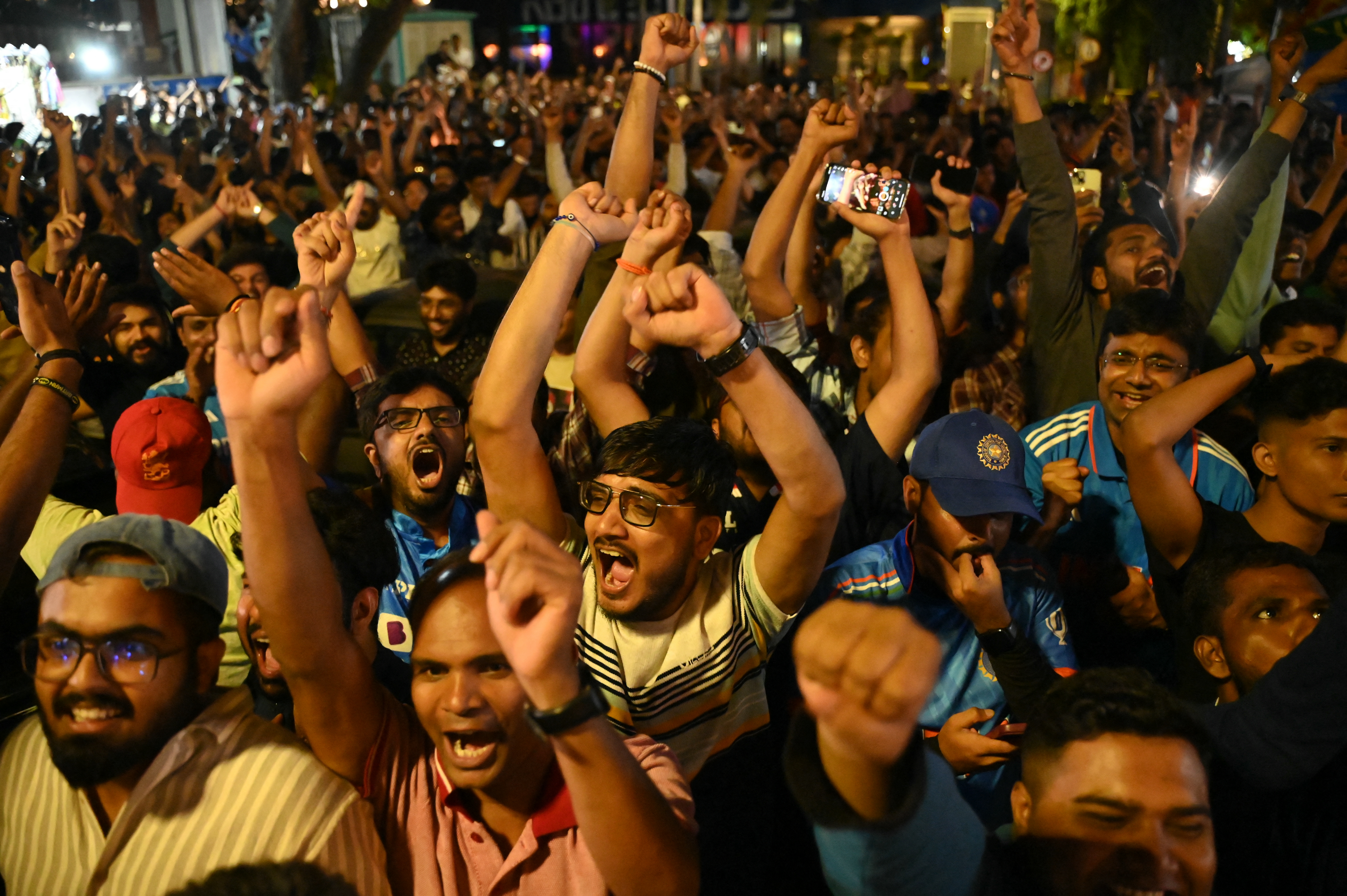 Supporters celebrate after India victory in the ICC Men's T20 World Cup final cricket match against South Africa, in Bengaluru on June 29