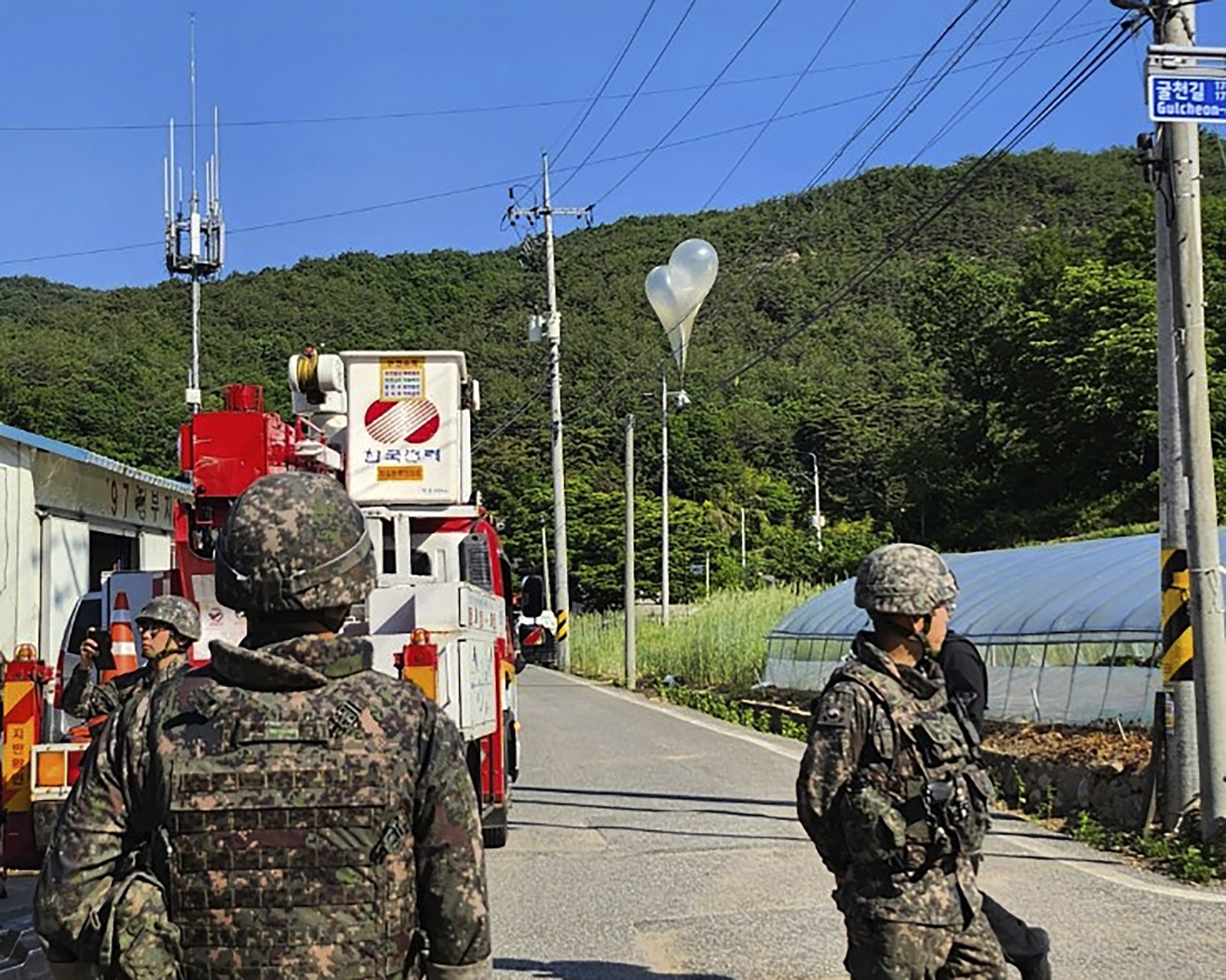 South Korean army soldiers stand guard