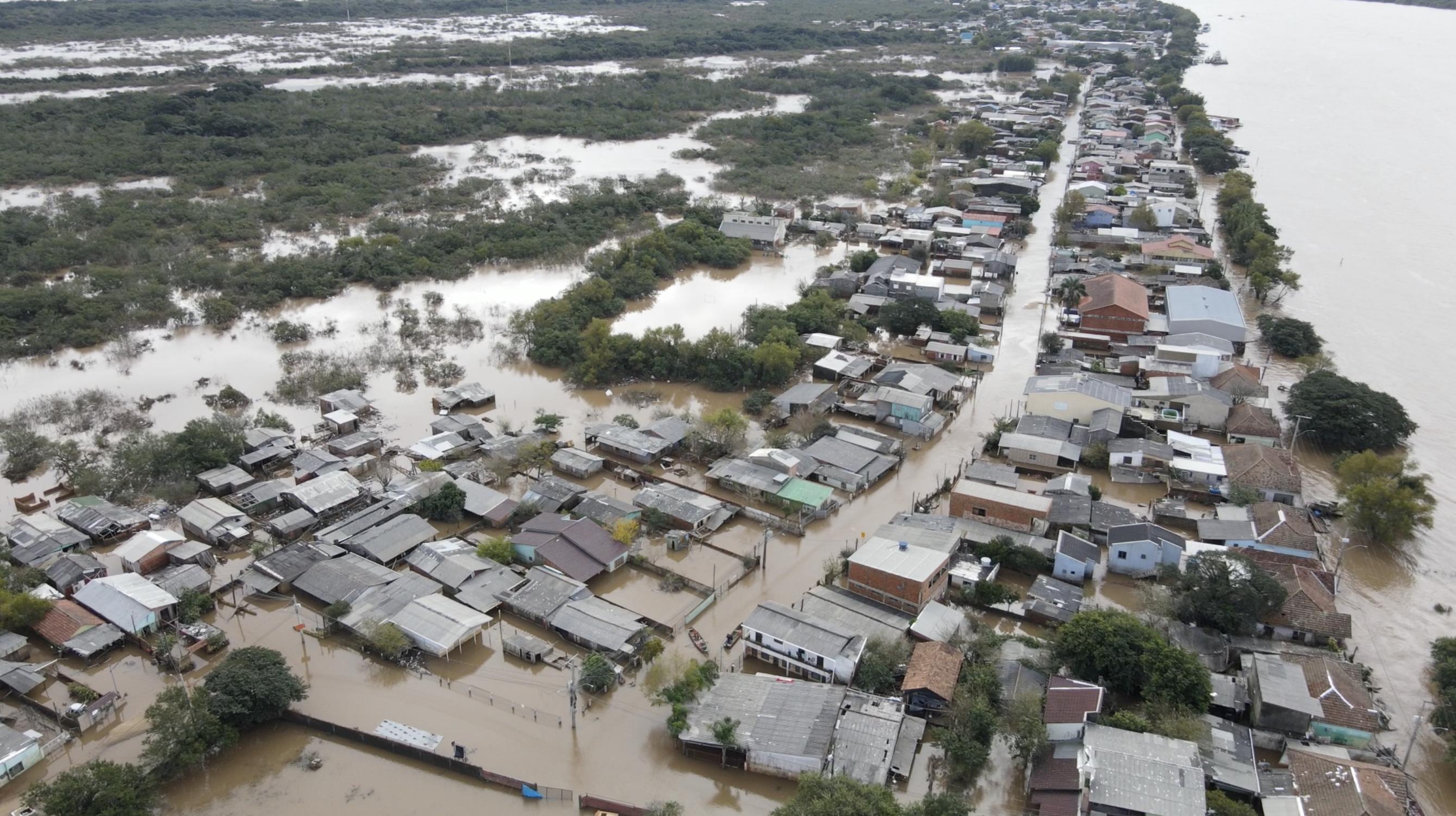 An aerial view of the Ilhas neighbourhood of Porto Alegre, Brazil, as the river rises to local streets.