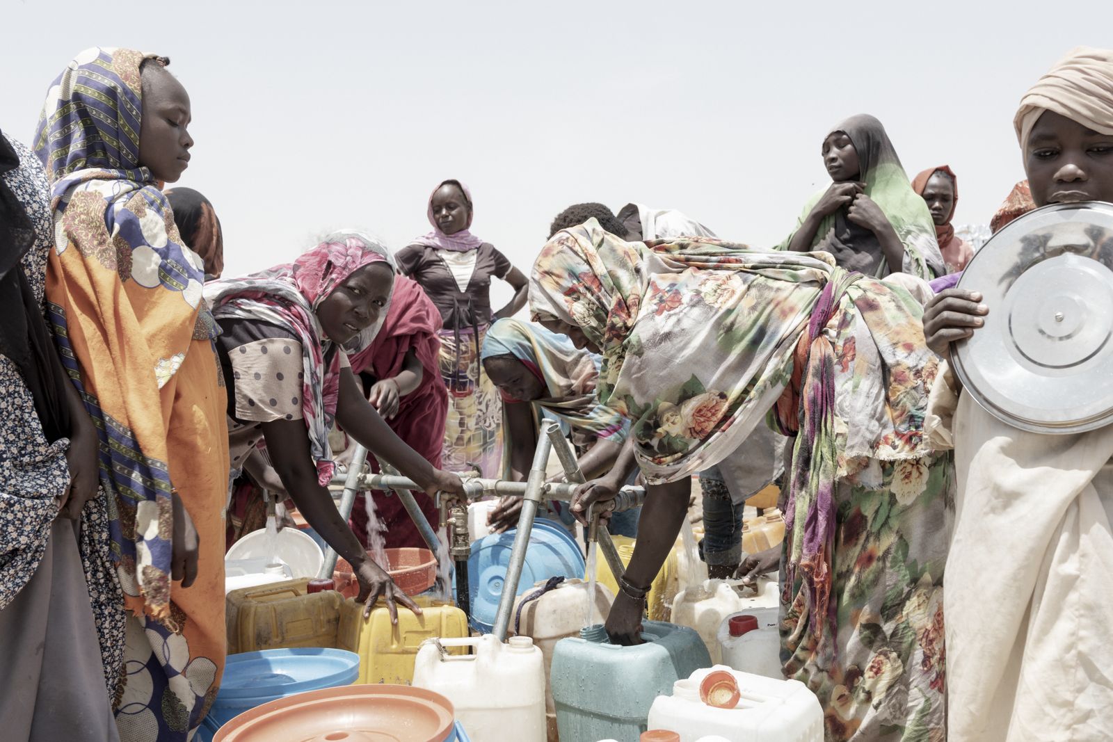 Sudanese refugee women prepare to head to the wadis in eastern Chad to get water.