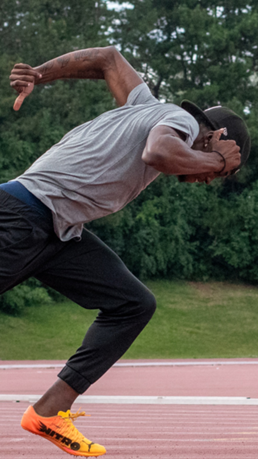 Tamarri Lindo races across an outdoor track