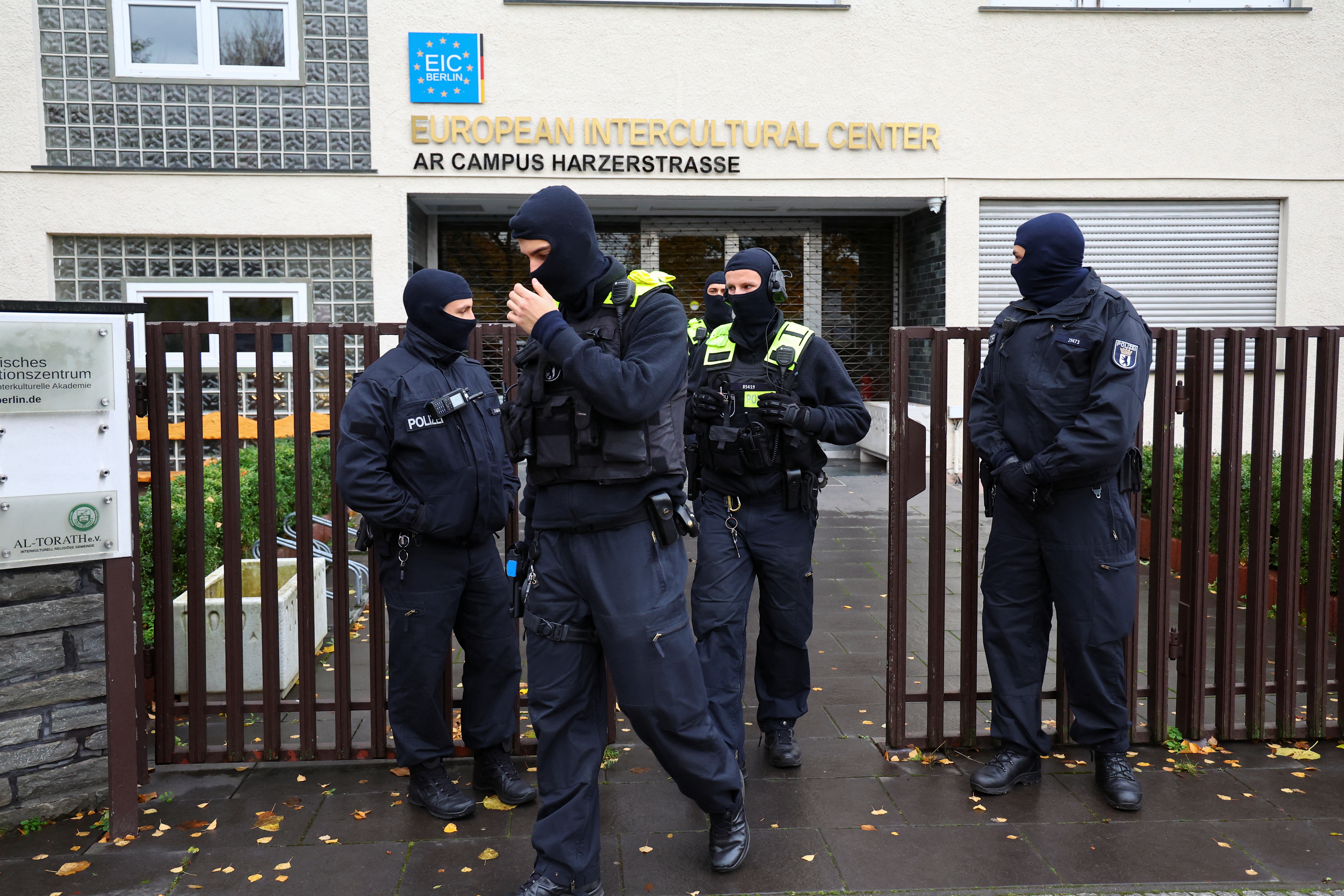 German police leave the building after raiding an Islamic center at Neukoelln district, following the Islamic Center Hamburg being under suspicion of acting against a constitutional order and supporting the militant group Hezbollah in Berlin, Germany, November 16, 2023. REUTERS/Fabrizio Bensch