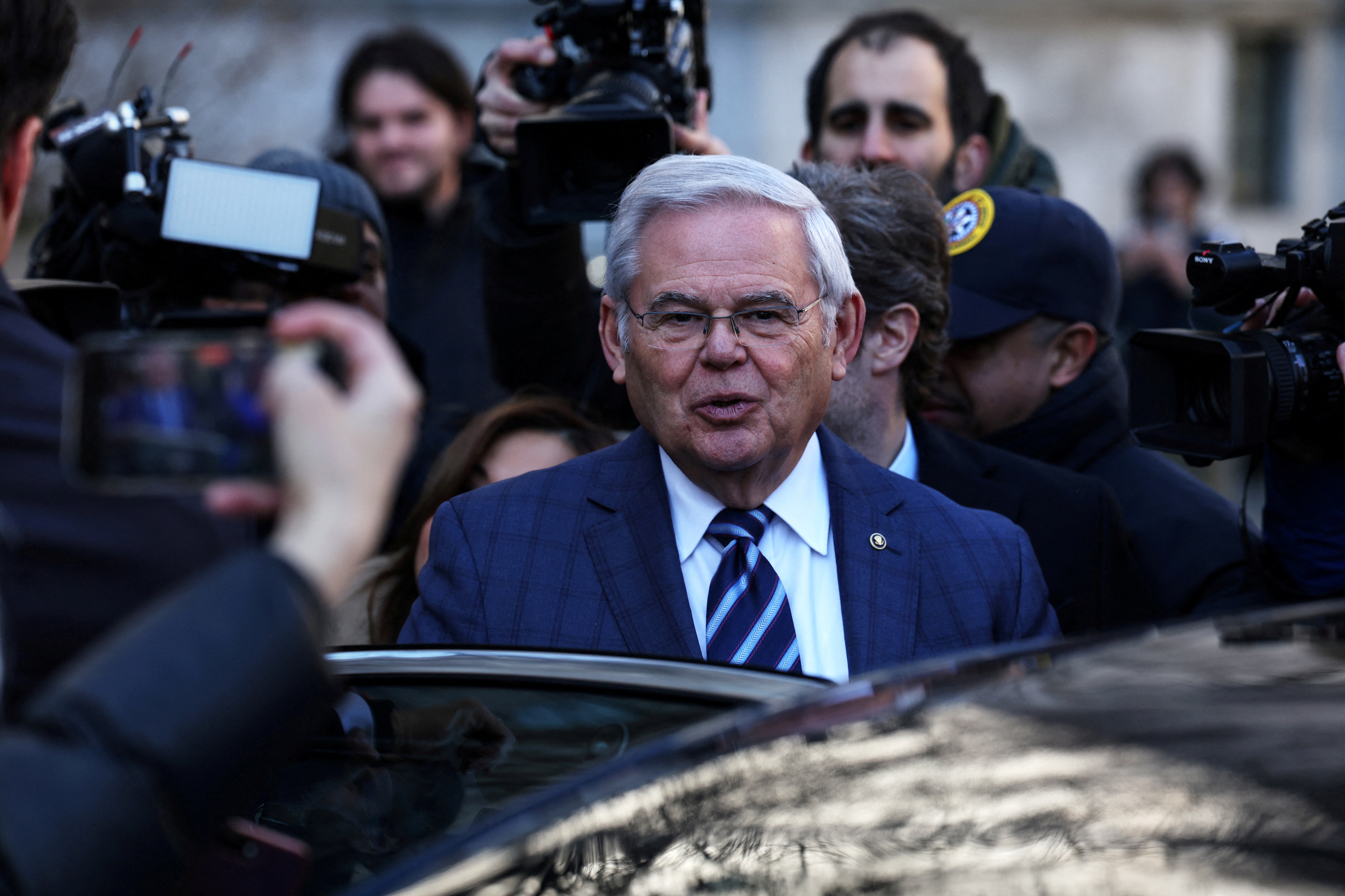 U.S. Senator Bob Menendez leaves his arraignment on a new 18-count indictment that added obstruction charges to bribery and other corruption charges