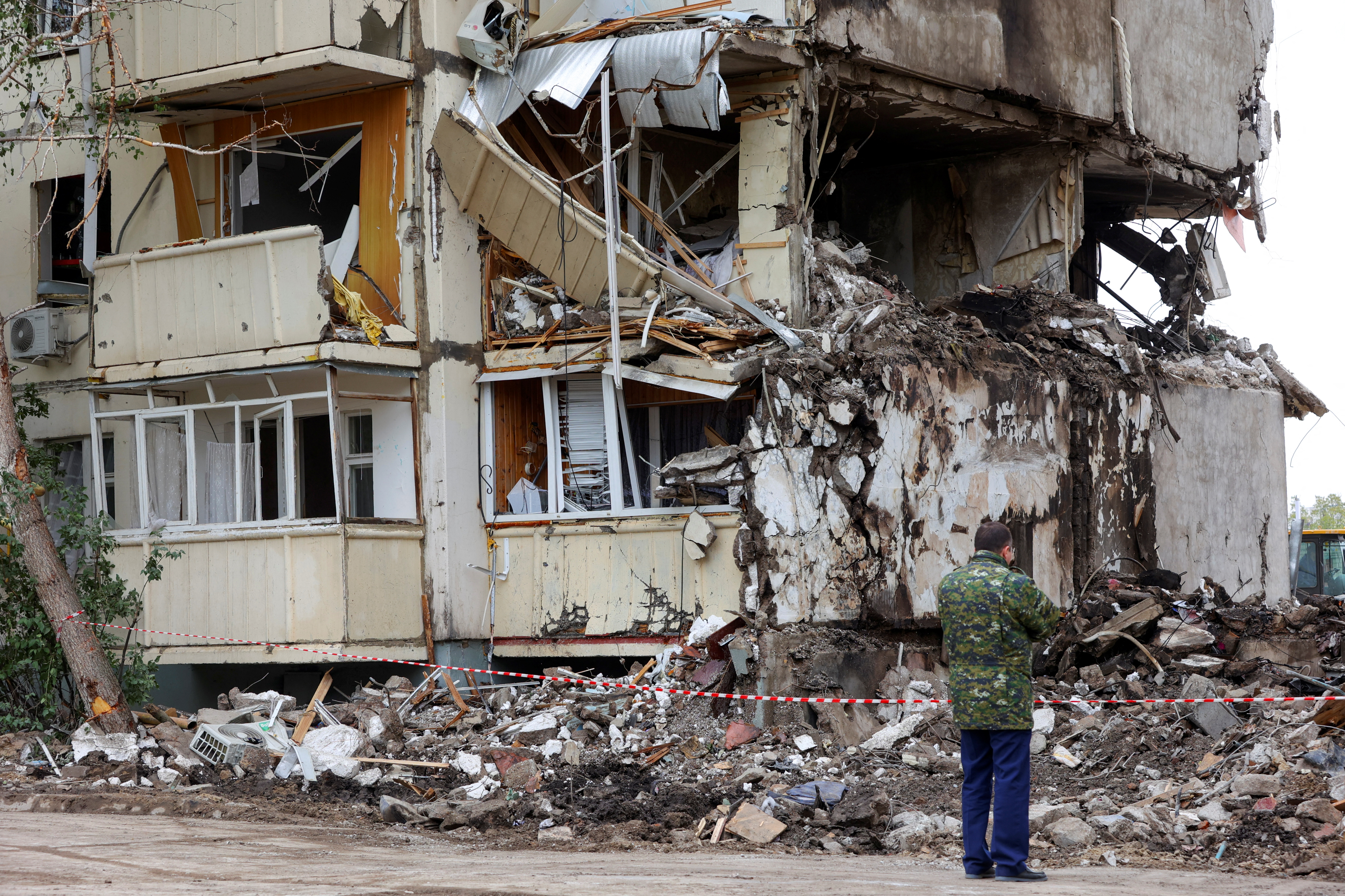 A view shows a damaged multi-story apartment block, a section of which collapsed as the result of what local authorities called a Ukrainian missile strike, in the course of Russia-Ukraine conflict in the city of Belgorod, Russia, May 13, 2024. REUTERS/Stringer