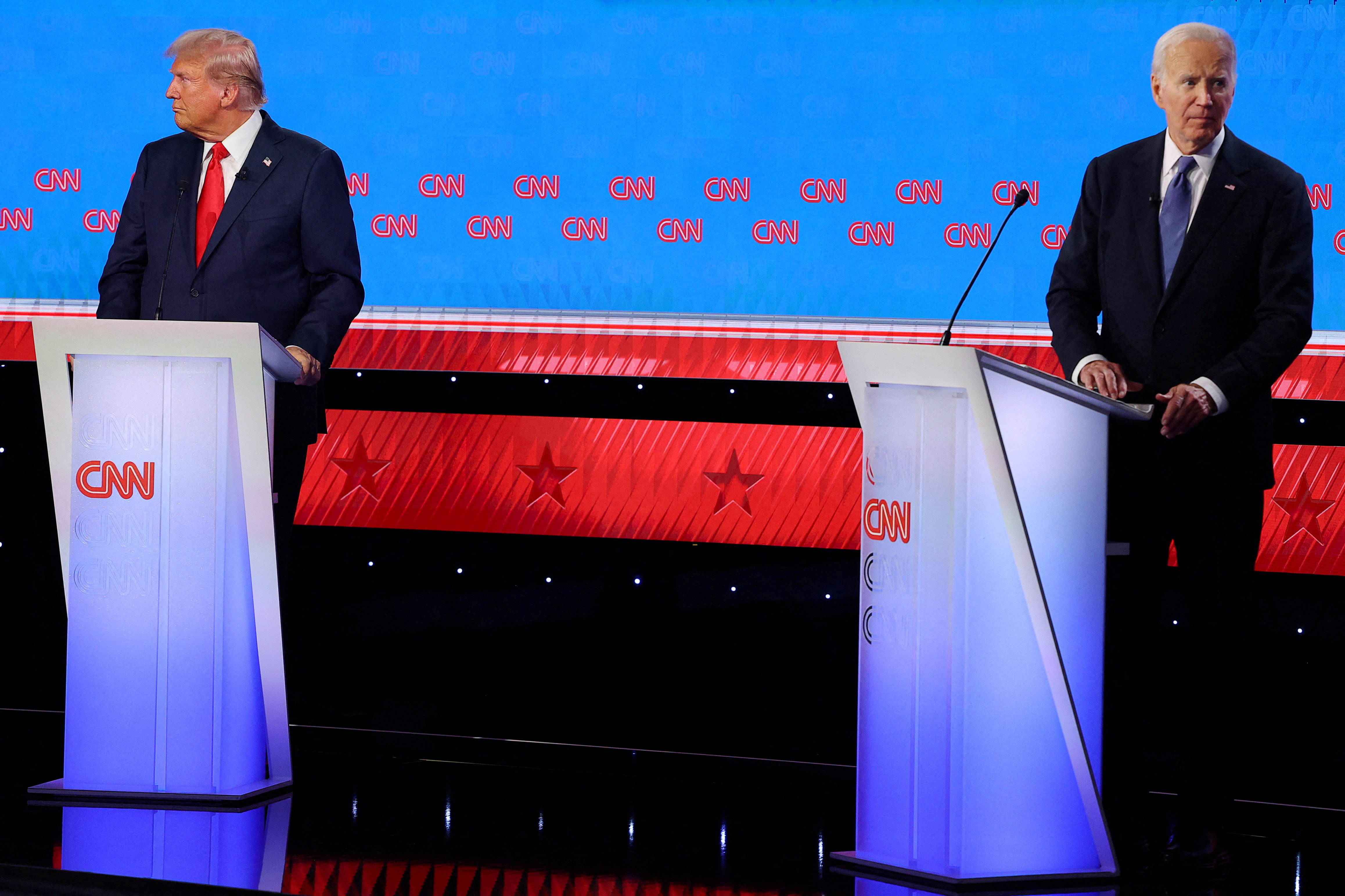 FILE PHOTO: Democrat presidential candidate U.S. President Joe Biden and Republican presidential candidate and former U.S. President Donald Trump looks away from each other during their debate in Atlanta, Georgia, U.S., June 27, 2024. REUTERS/Brian Snyder/File Photo